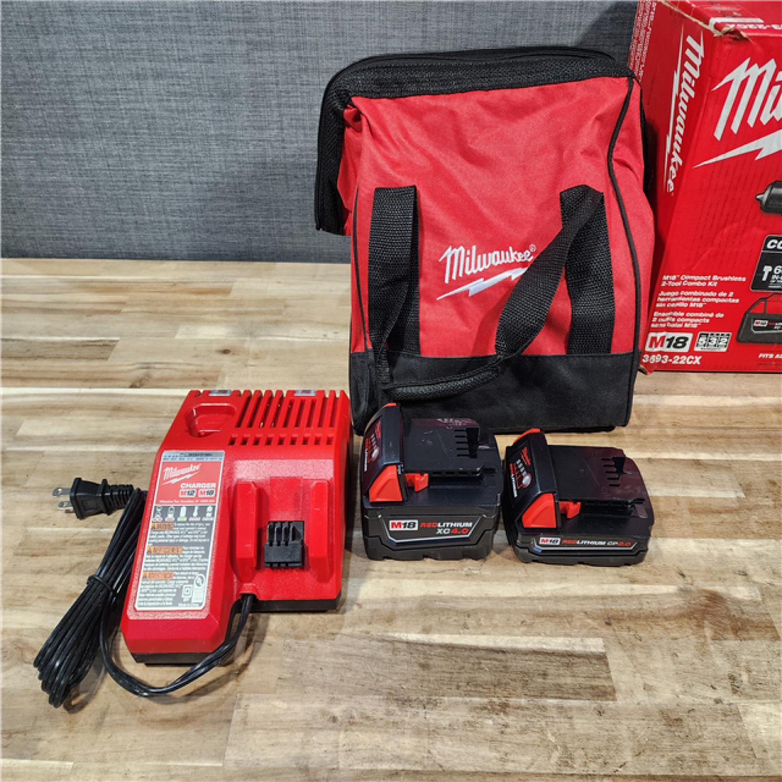 HOUSTON LOCATION - AS-IS M18 18-Volt Lithium-Ion Brushless Cordless Compact Hammer Drill/Impact Combo Kit (2-Tool) with (2) Batteries  Bag