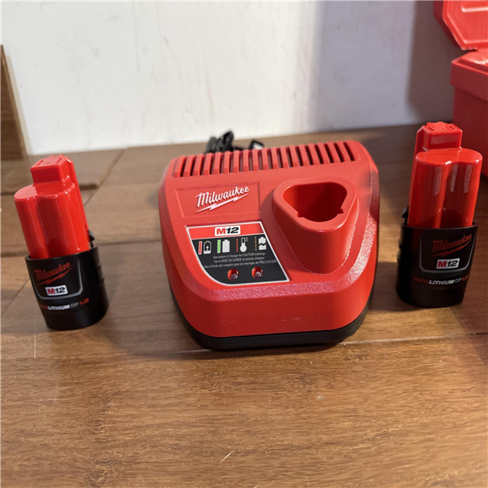 California AS-IS Milwaukee M12 Force Logic Press Tool  Includes (2) Batteries  Charger and Hard Case