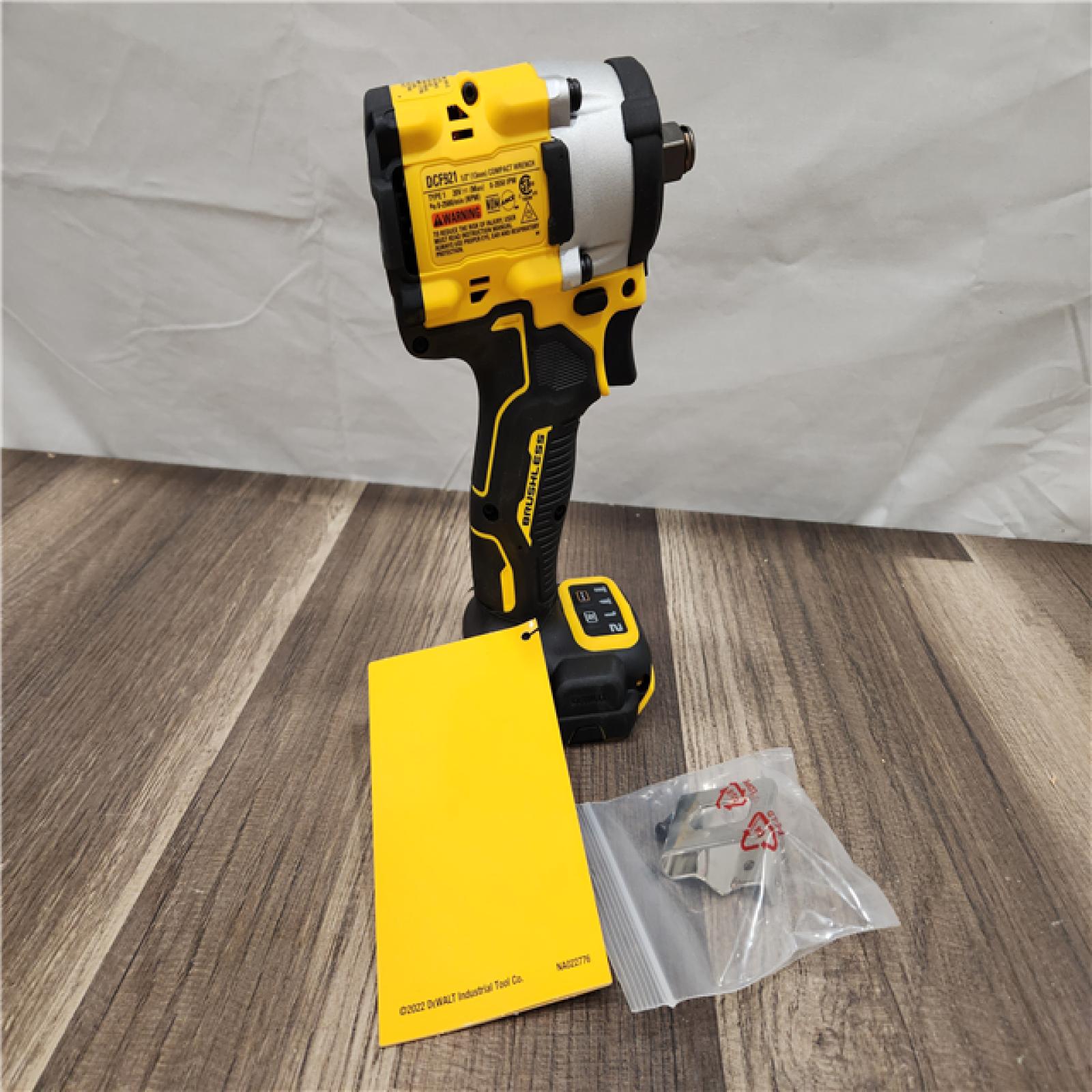 AS-IS DEWALT ATOMIC 20V MAX Cordless Brushless 1/2 in. Variable Speed Impact Wrench (Tool Only)