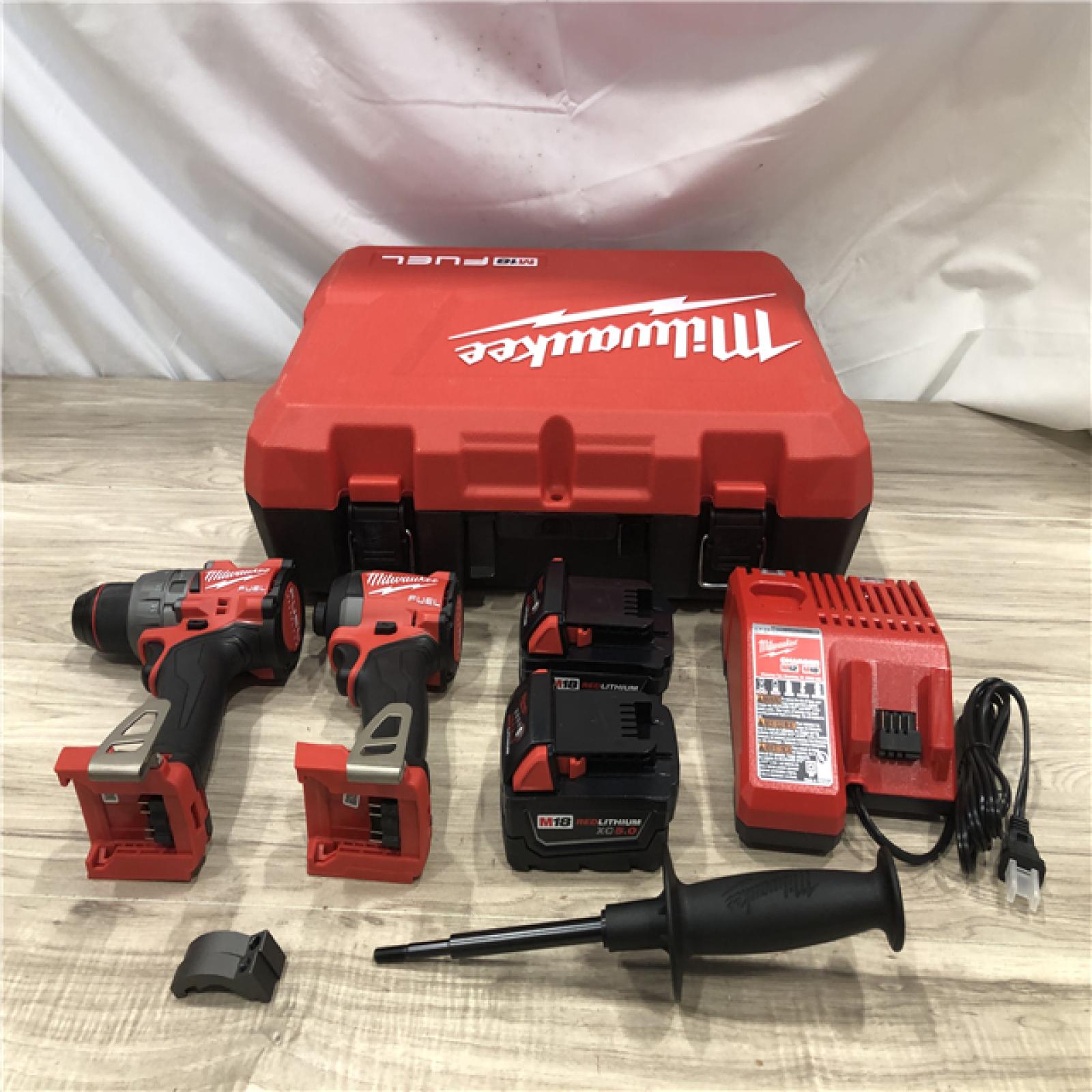 AS-IS Milwaukee FUEL 18V Lithium-Ion Cordless Hammer Drill and Impact Driver Combo Kit