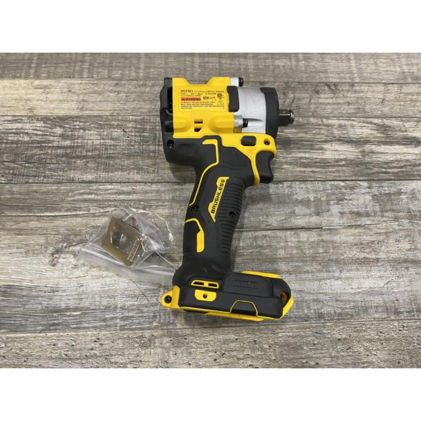 AS-IS DEWALT ATOMIC 20V MAX Cordless Brushless 1/2 in. Variable Speed Impact Wrench (Tool Only)
