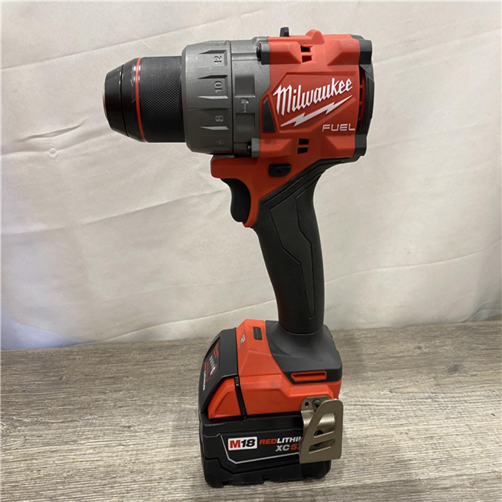 AS-IS Milwaukee FUEL 18V Lithium-Ion Brushless Cordless 1/2 in. Hammer Drill Driver Kit