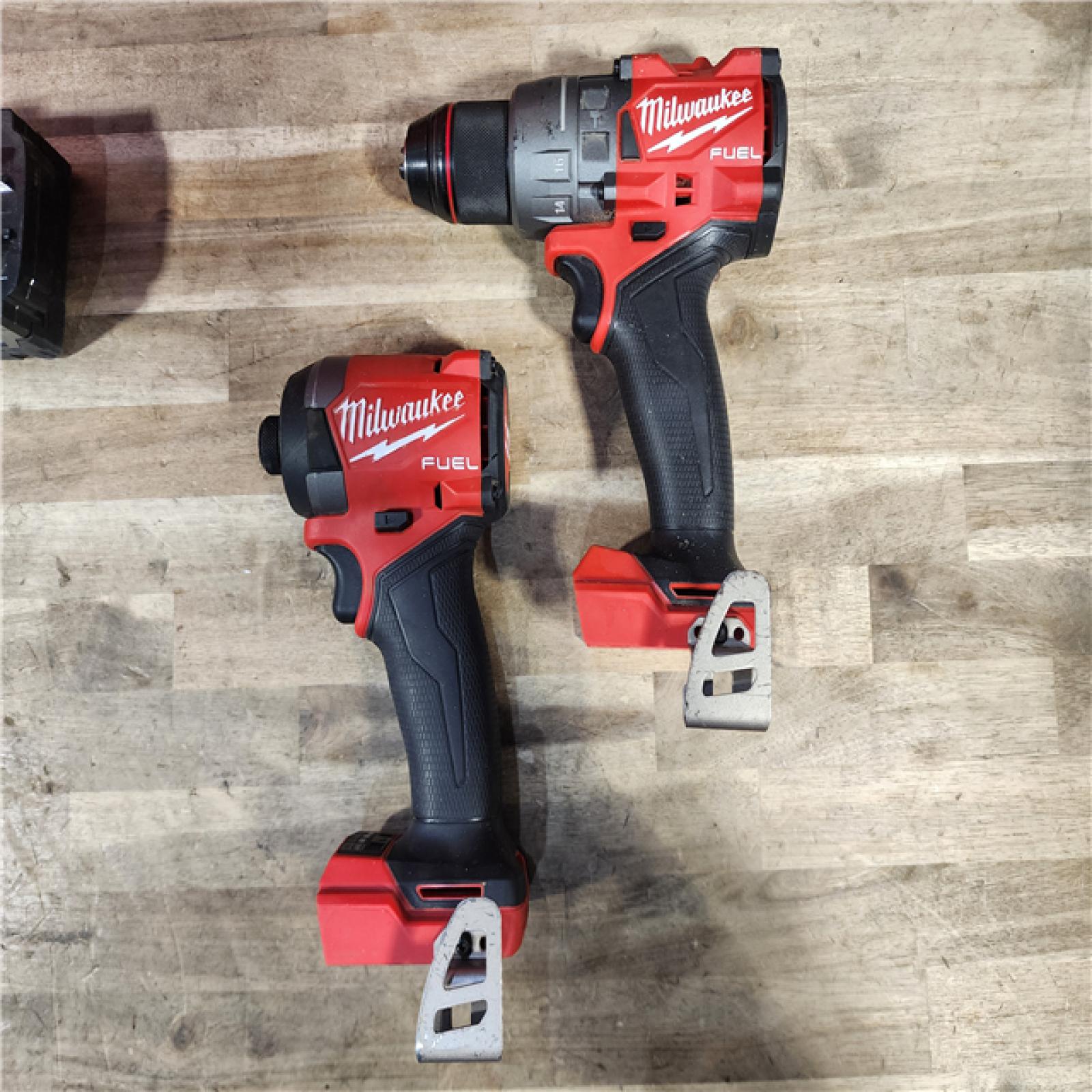 HOUSTON LOCATION - AS-IS MILWAUKEE FUEL 18V Lithium-Ion Brushless Cordless Hammer Drill and Impact Driver Combo Kit