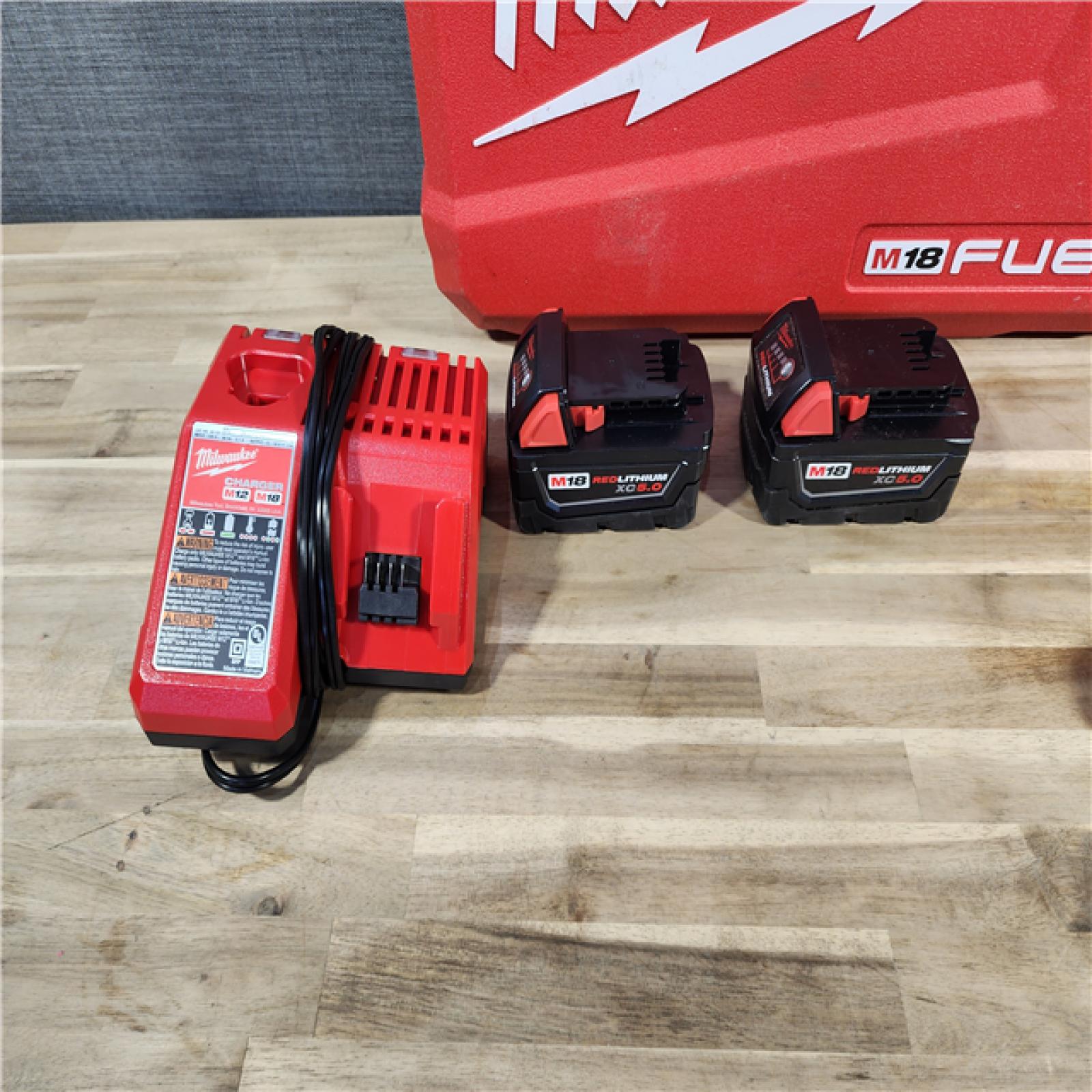 HOUSTON LOCATION - AS-IS MILWAUKEE M18 FUEL 18V Lithium-Ion Brushless Cordless Hammer Drill and Impact Driver Combo Kit (2-Tool) with 2 Batteries