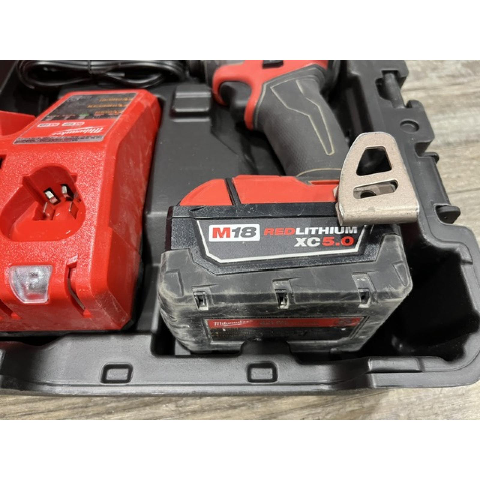 AS-IS Milwaukee FUEL 18V Lithium-Ion Brushless Cordless Hammer Drill and Impact Driver Combo Kit