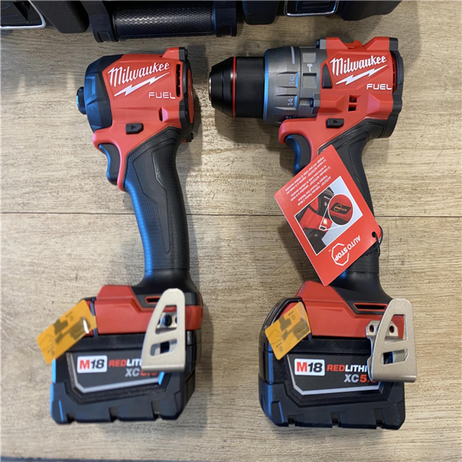 AS-IS Milwaukee FUEL 18V Lithium-Ion Brushless Cordless Hammer Drill & SURGE Impact Driver Combo Kit