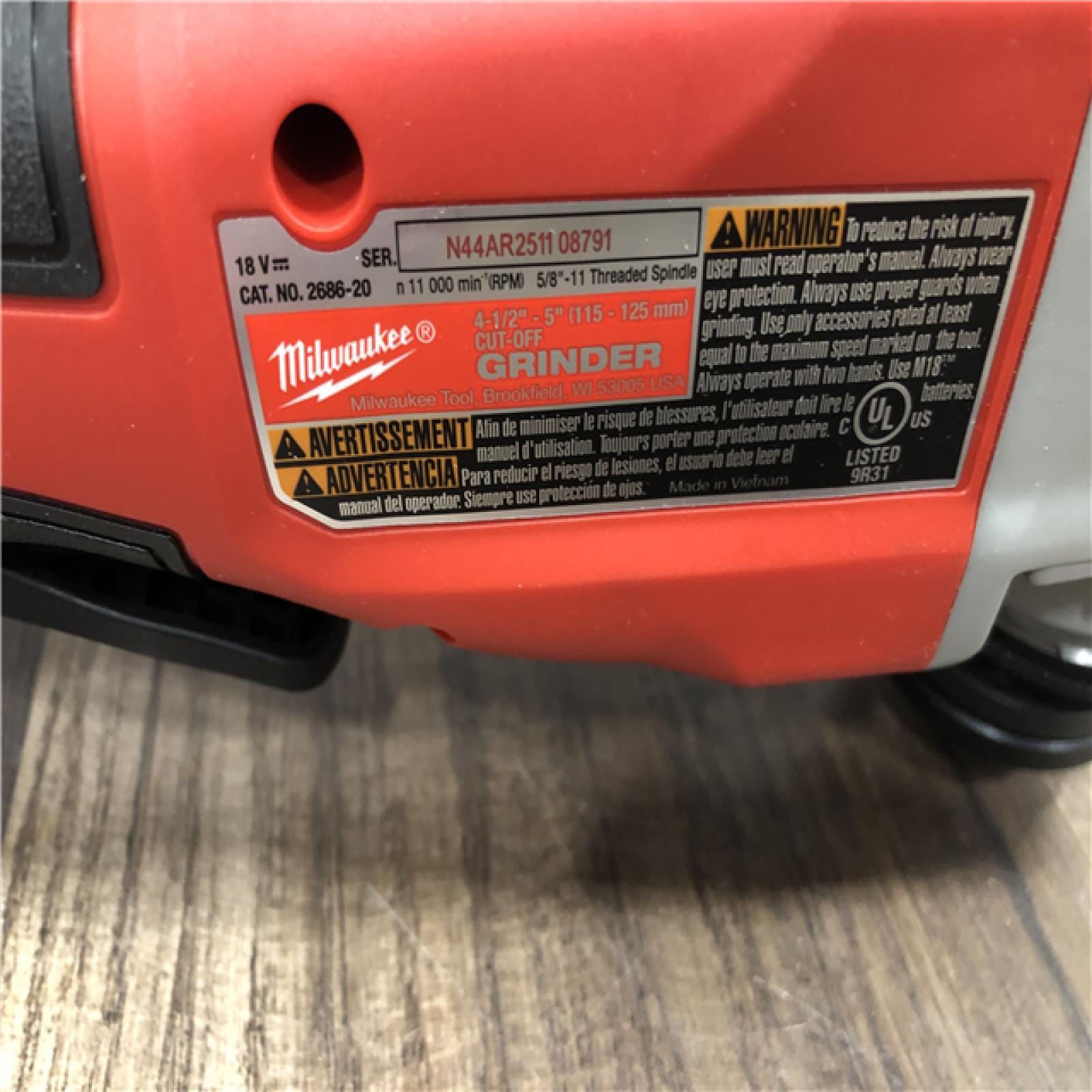 AS-IS Milwaukee 18V Lithium-Ion Brushless Cordless 4-1/2 in./5 in. Grinder w/Paddle Switch (Tool-Only)