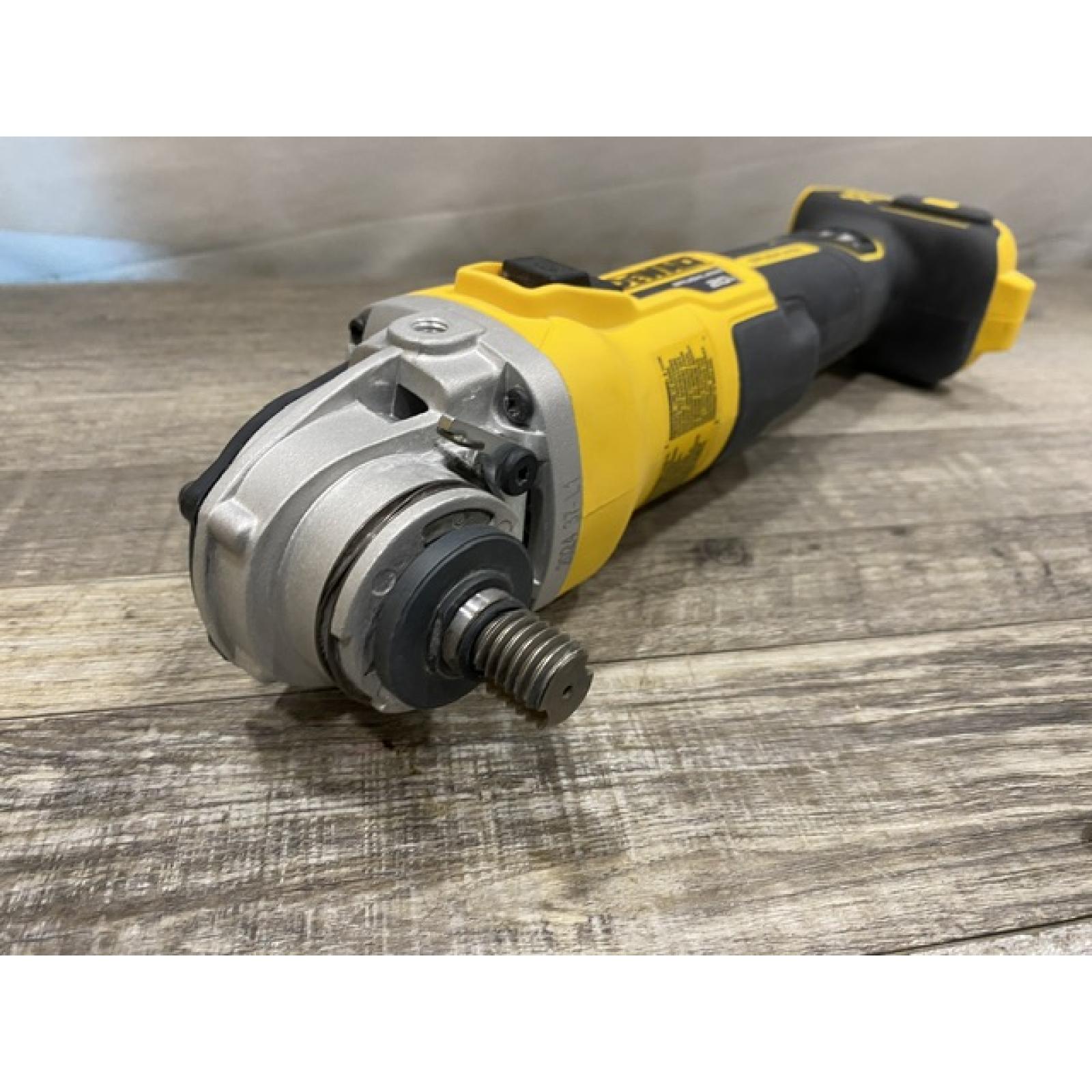 AS-IS DEWALT 20V MAX XR Cordless Brushless 4.5 in. Slide Switch Small Angle Grinder with Kickback Brake (Tool Only)