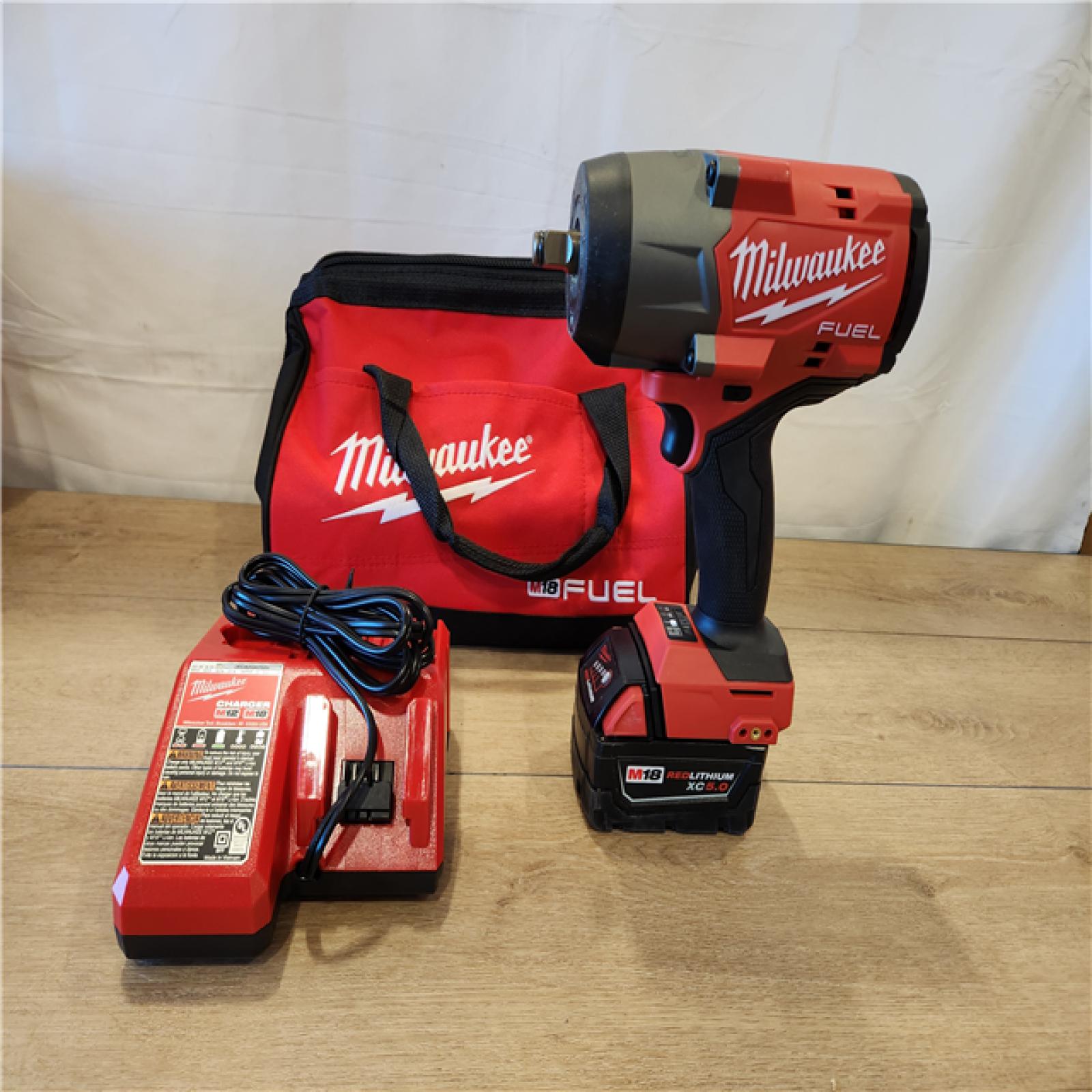 AS-IS- Milwaukee FUEL 18V Lithium-Ion Brushless Cordless 1/2 in. Impact Wrench w/Friction Ring Kit