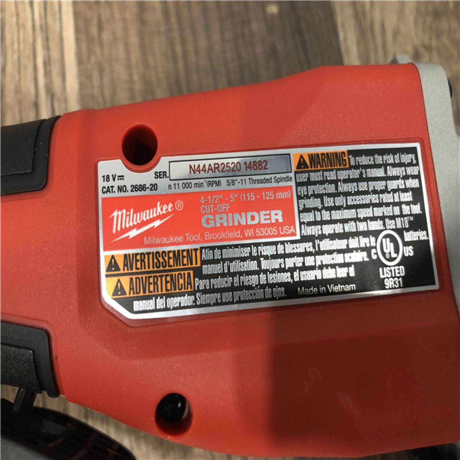 AS-IS Milwaukee 18V Lithium-Ion Brushless Cordless 4-1/2 in./5 in. Grinder w/Paddle Switch (Tool-Only)