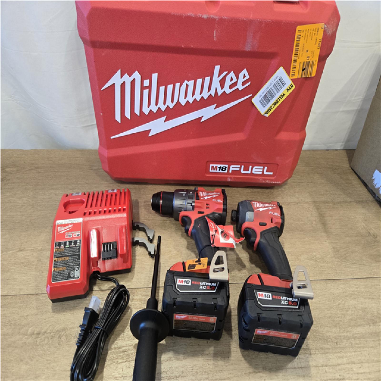 AS-IS Milwaukee FUEL 18V Lithium-Ion Brushless Cordless Hammer Drill and Impact Driver Combo Kit