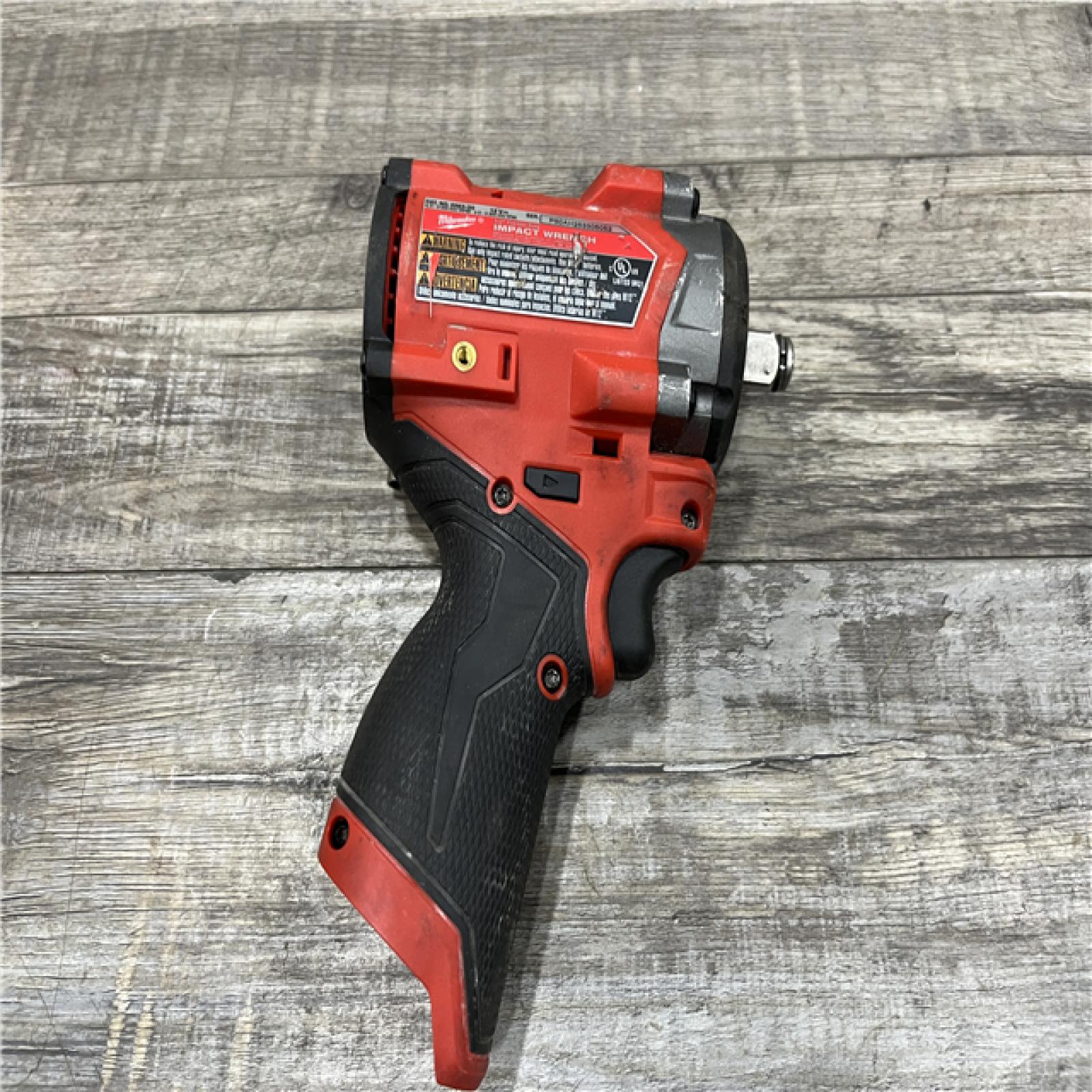 AS-IS Milwaukee FUEL 12V Lithium-Ion Brushless Cordless Stubby 1/2 in. Impact Wrench (Tool-Only)