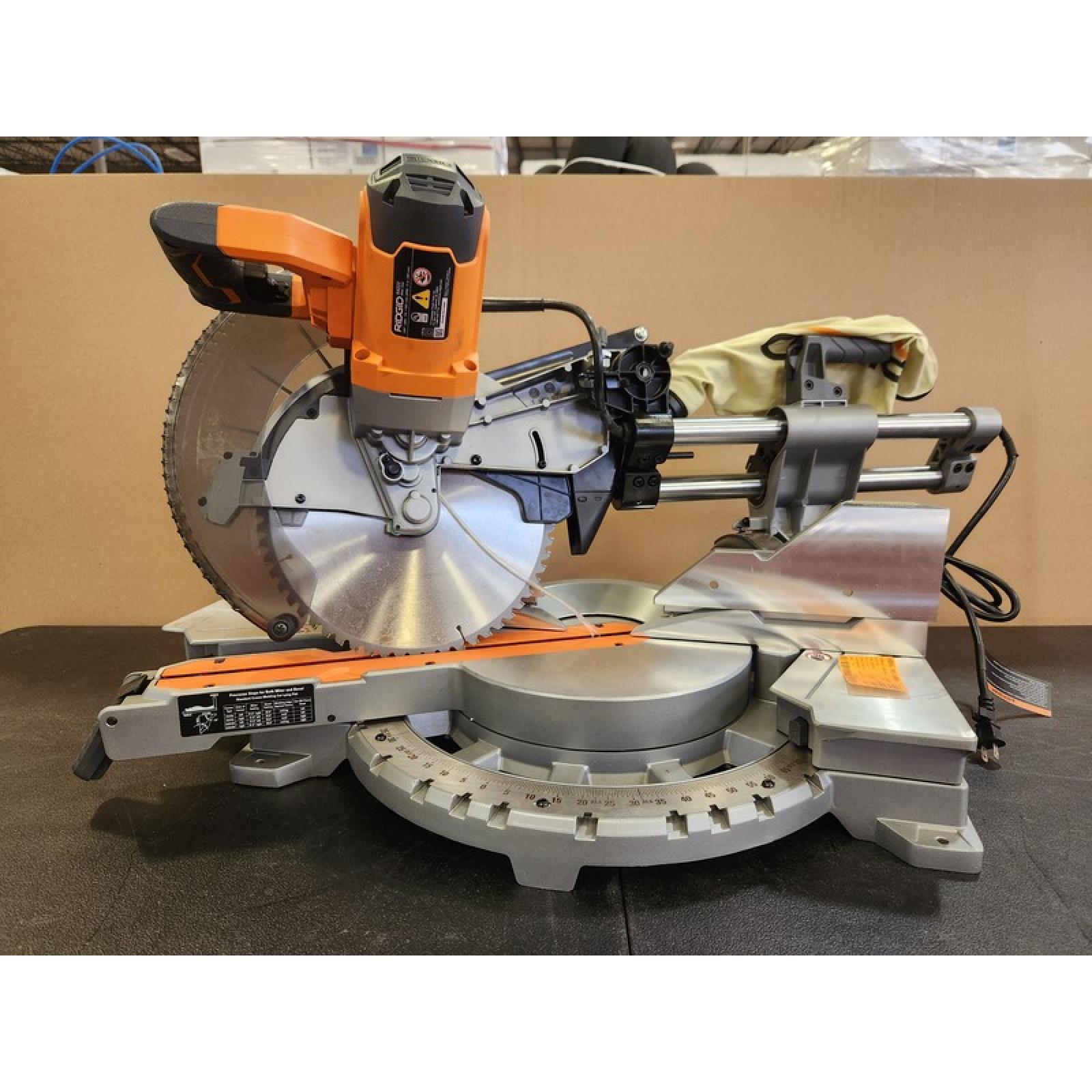Phoenix NEW RIDGID 15 Amp Corded 12 in. Dual Bevel Sliding Miter Saw with 70 Deg. Miter Capacity and LED Cut Line Indicator