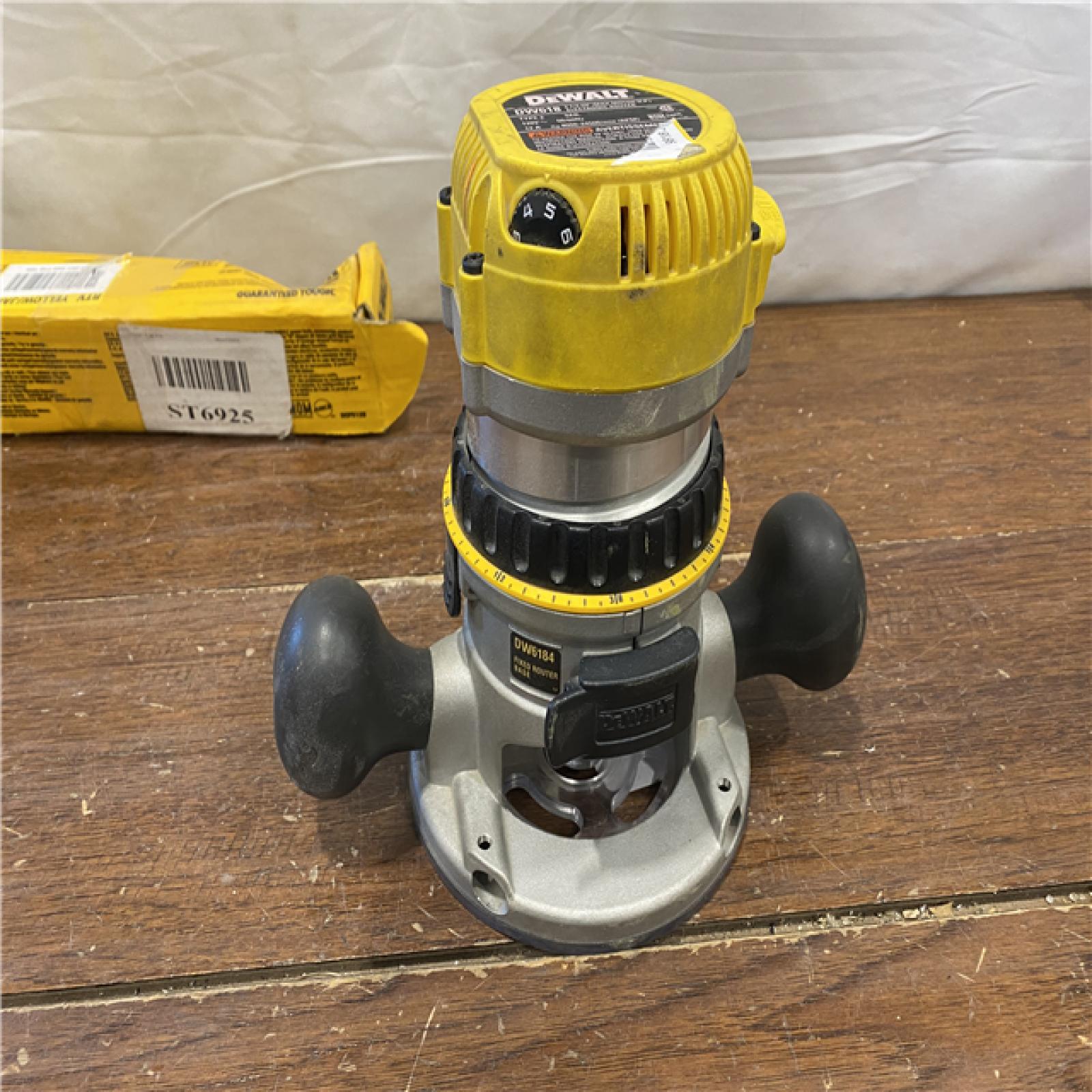 AS-IS DEWALT 12 Amp Corded 2-1/4 Horsepower Electronic Variable Speed Fixed Base Router with Soft Start