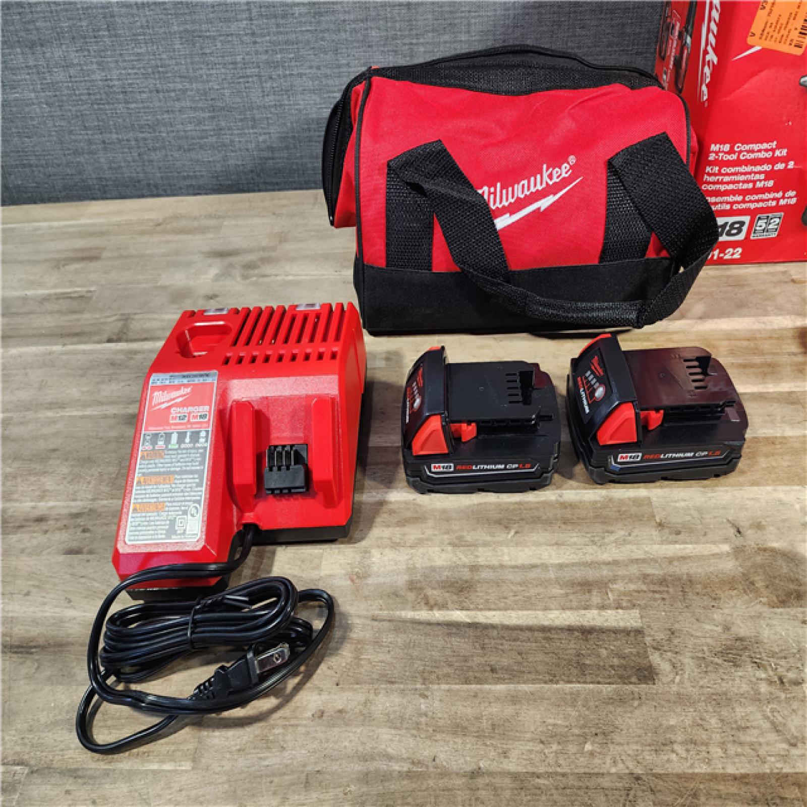 HOUSTON LOCATION - AS-IS Milwaukee M18 Brushed Cordless (2-Tool) Drill/Driver and Impact Driver Kit
