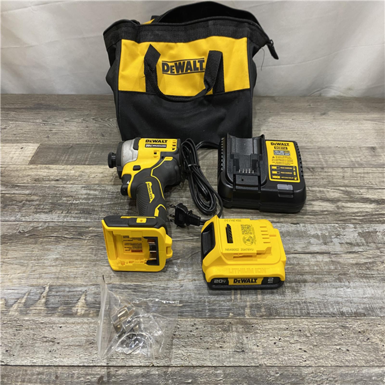 AS-IS DEWALT Atomic 20V Max Lithium-Ion Brushless Cordless Compact 1/4 in. Impact Driver Kit