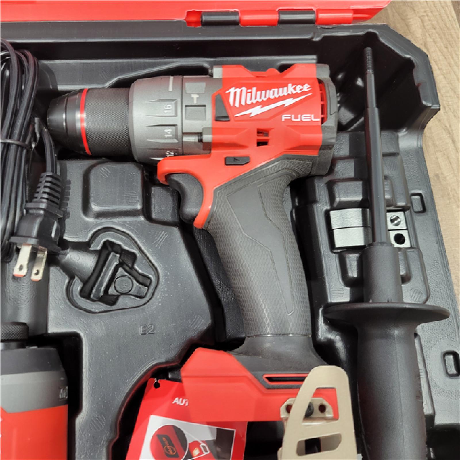 AS-IS MILWAUKEE M18 FUEL 18V Lithium-Ion Brushless Cordless Hammer Drill and Impact Driver Combo Kit (2-Tool) with 2 Batteries