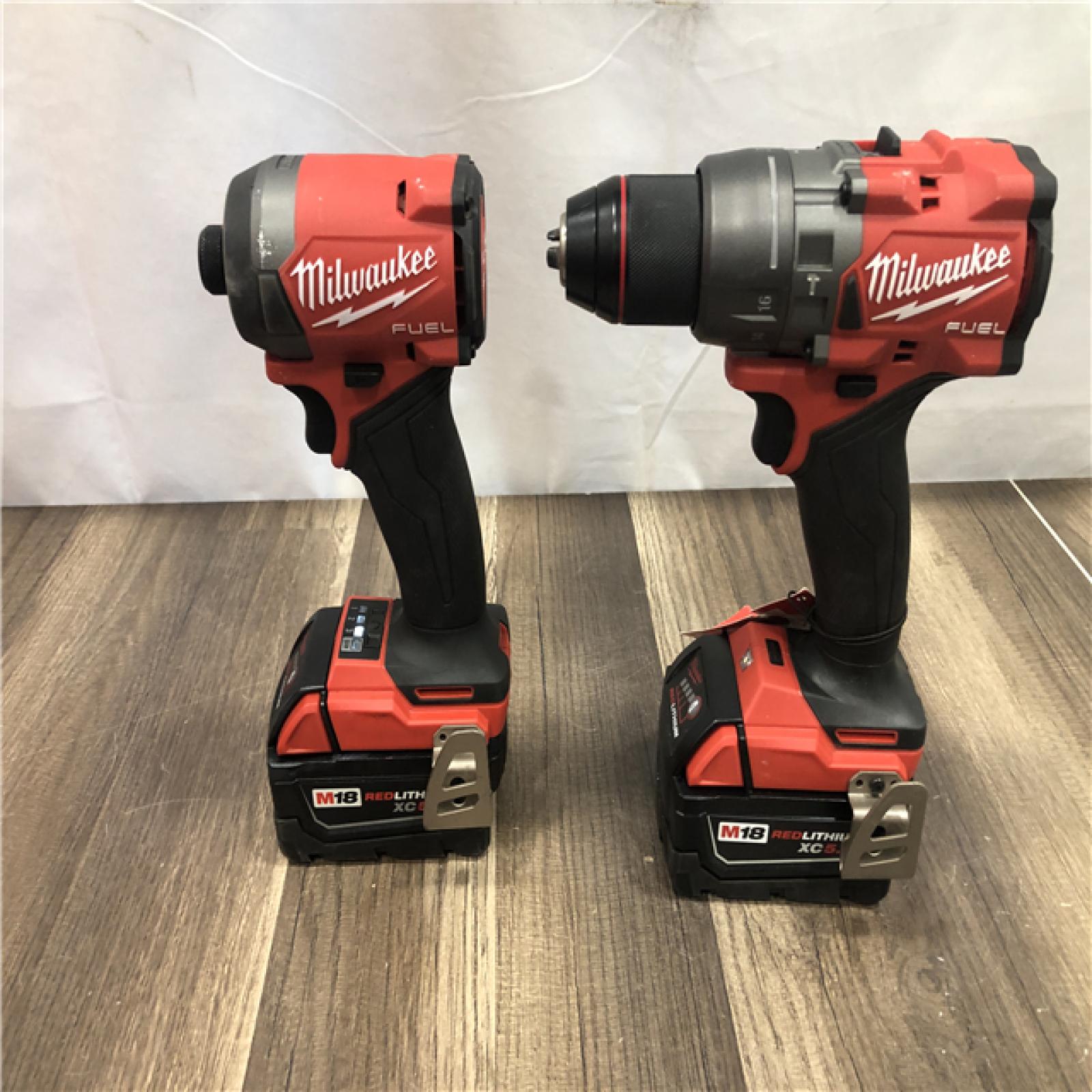 AS-IS Milwaukee FUEL 18V Lithium-Ion Brushless Cordless Hammer Drill and Impact Driver Combo Kit