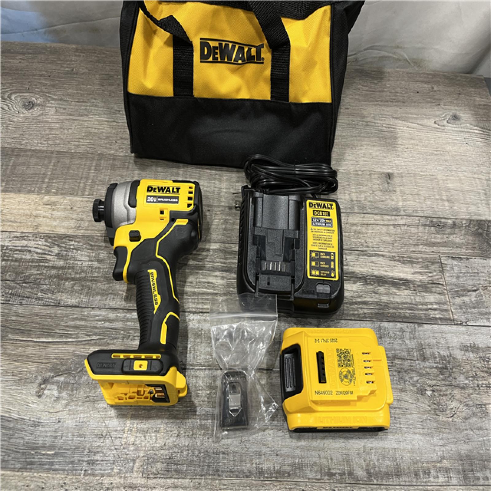 AS-IS DEWALT Atomic 20V Max Lithium-Ion Brushless Cordless Compact 1/4 in. Impact Driver Kit