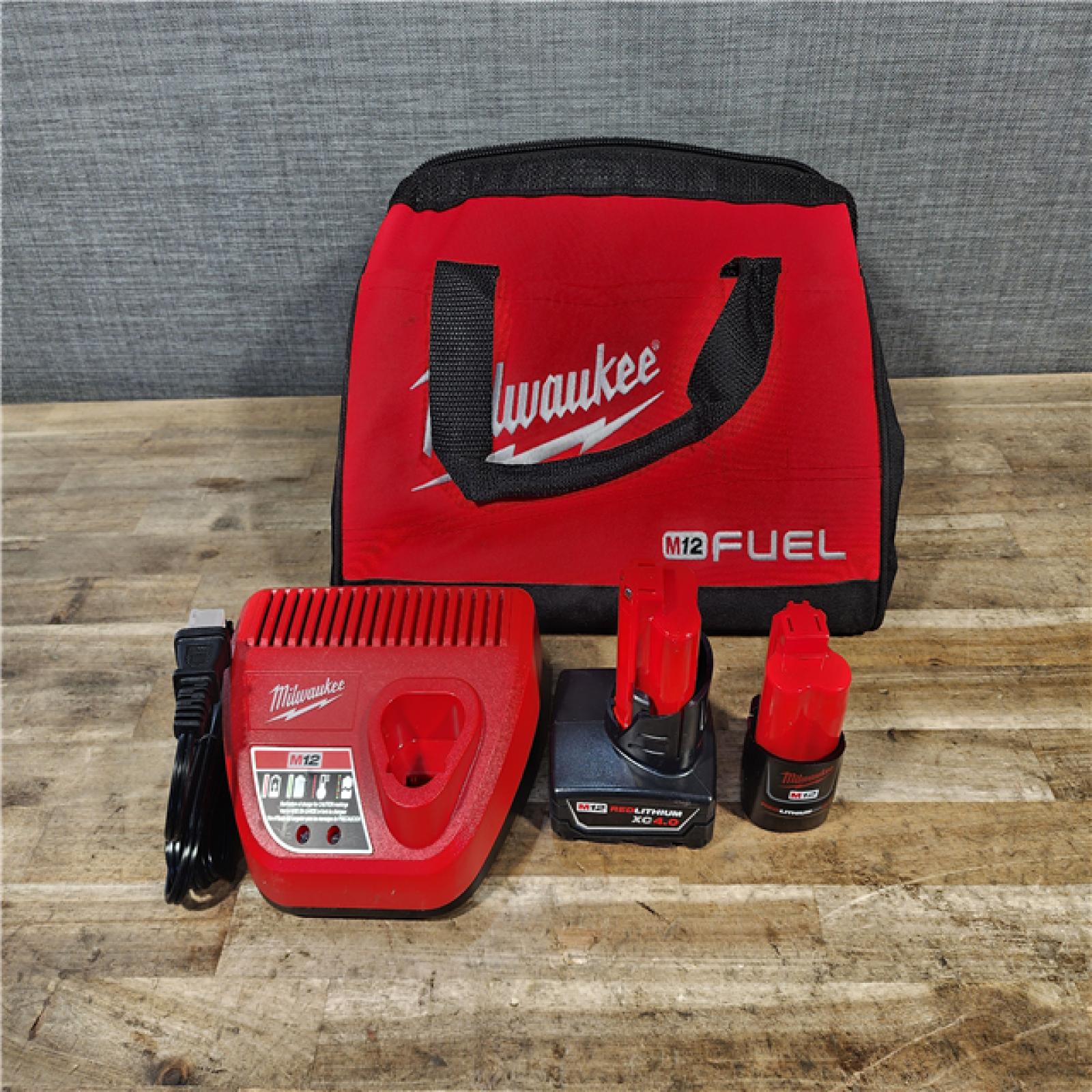 HOUSTON LOCATION - AS-IS Milwaukee FUEL 12-Volt Lithium-Ion Brushless Cordless Hammer Drill and Impact Driver Combo Kit