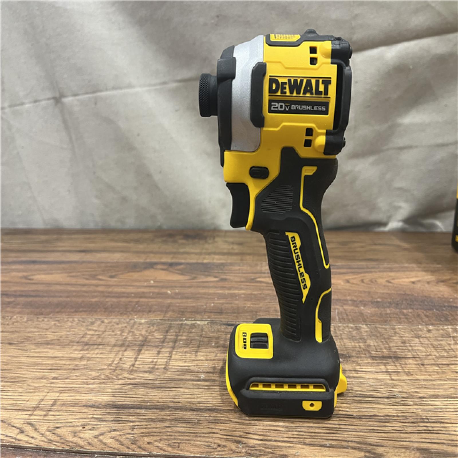 AS-IS DEWALT ATOMIC 20V MAX Lithium-Ion Cordless 1/4 in. Brushless Impact Driver Kit, 5 Ah Battery, Charger, and Bag