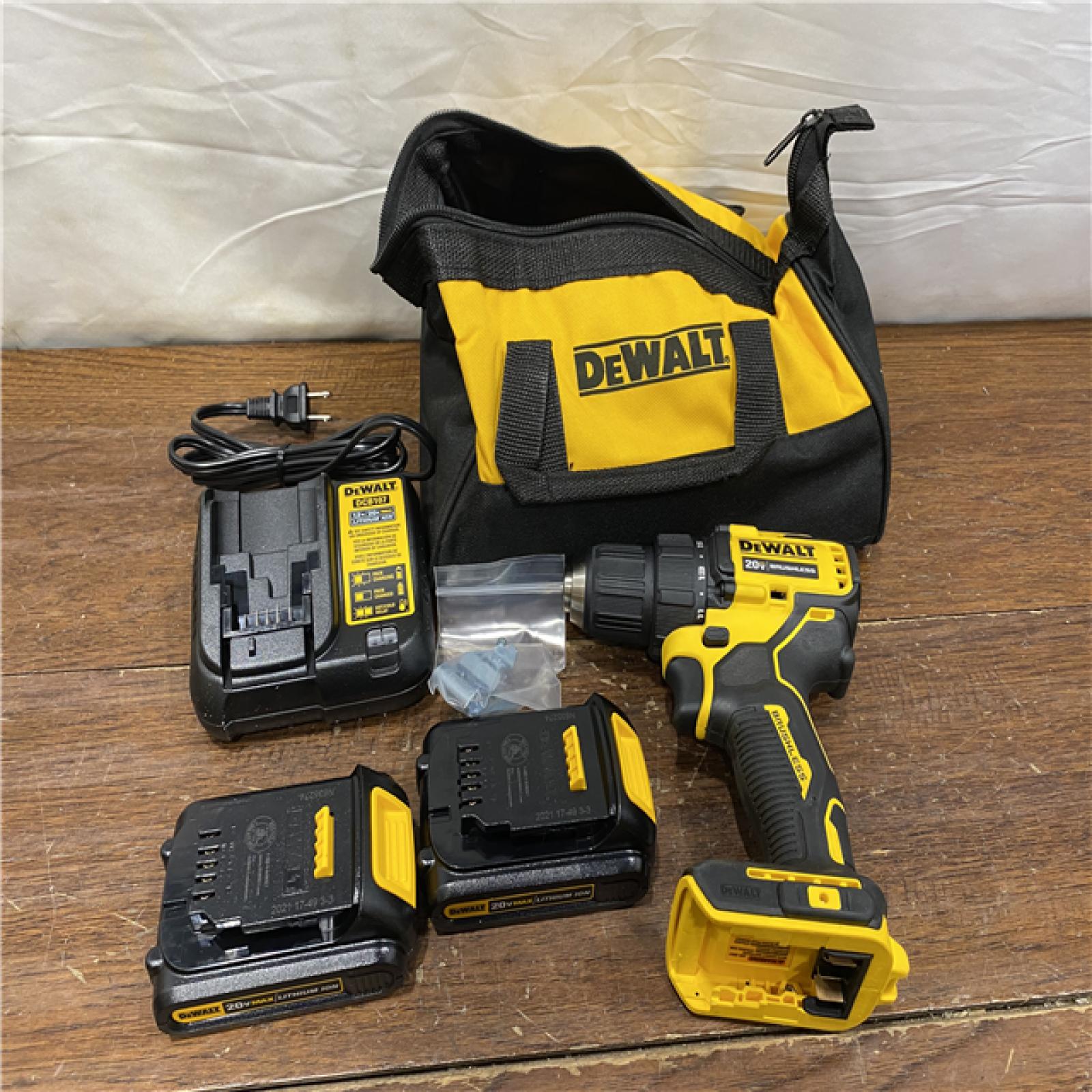 AS-ISATOMIC 20V MAX Cordless Brushless Compact 1/2 in. Drill/Driver, (2) 20V 1.3Ah Batteries, Charger and Bag