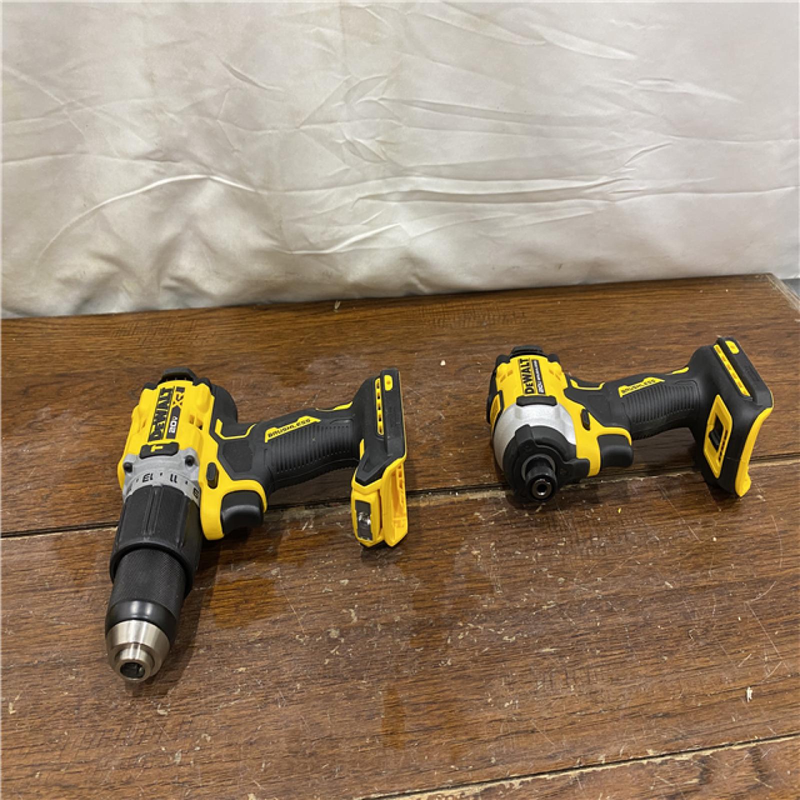 AS-IS DEWALT 20V MAX XR Hammer Drill and ATOMIC Impact Driver 2 Tool Cordless Combo Kit with (2) 4.0Ah Batteries, Charger, and Bag