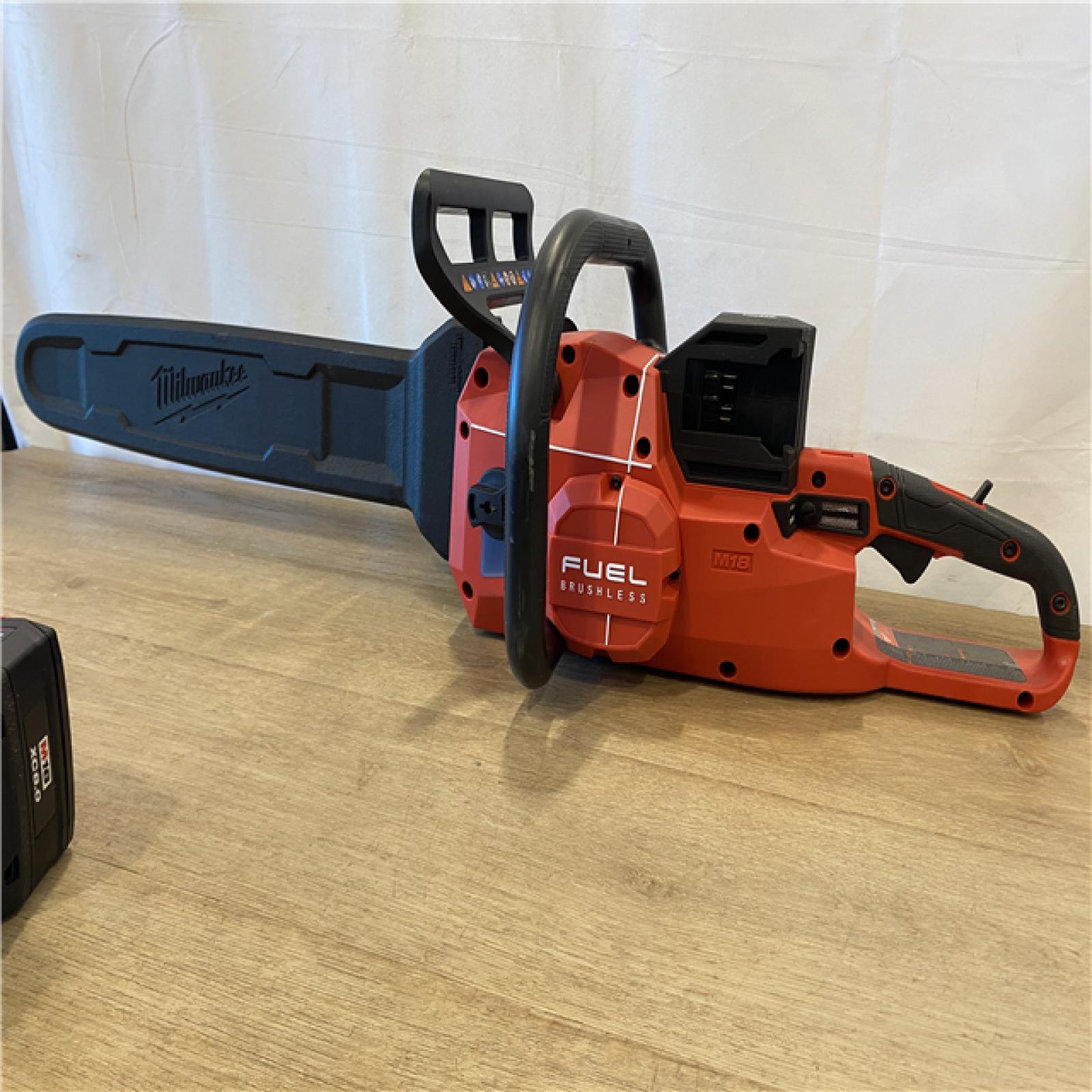 AS-IS Milwaukee FUEL 18V Brushless Cordless 20 in. Dual Battery Chainsaw Kit