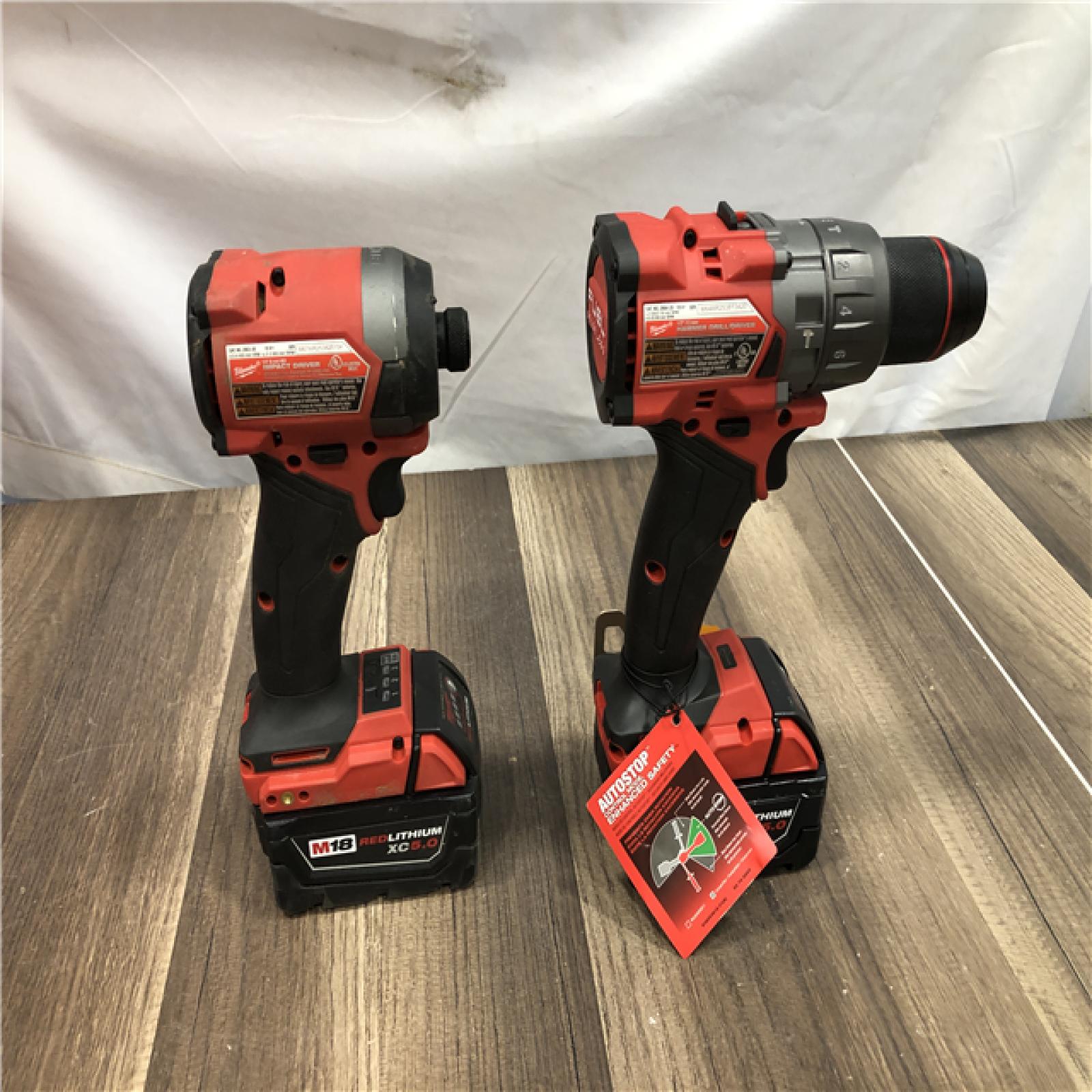AS-IS Milwaukee FUEL 18V Lithium-Ion Brushless Cordless Hammer Drill and Impact Driver Combo Kit