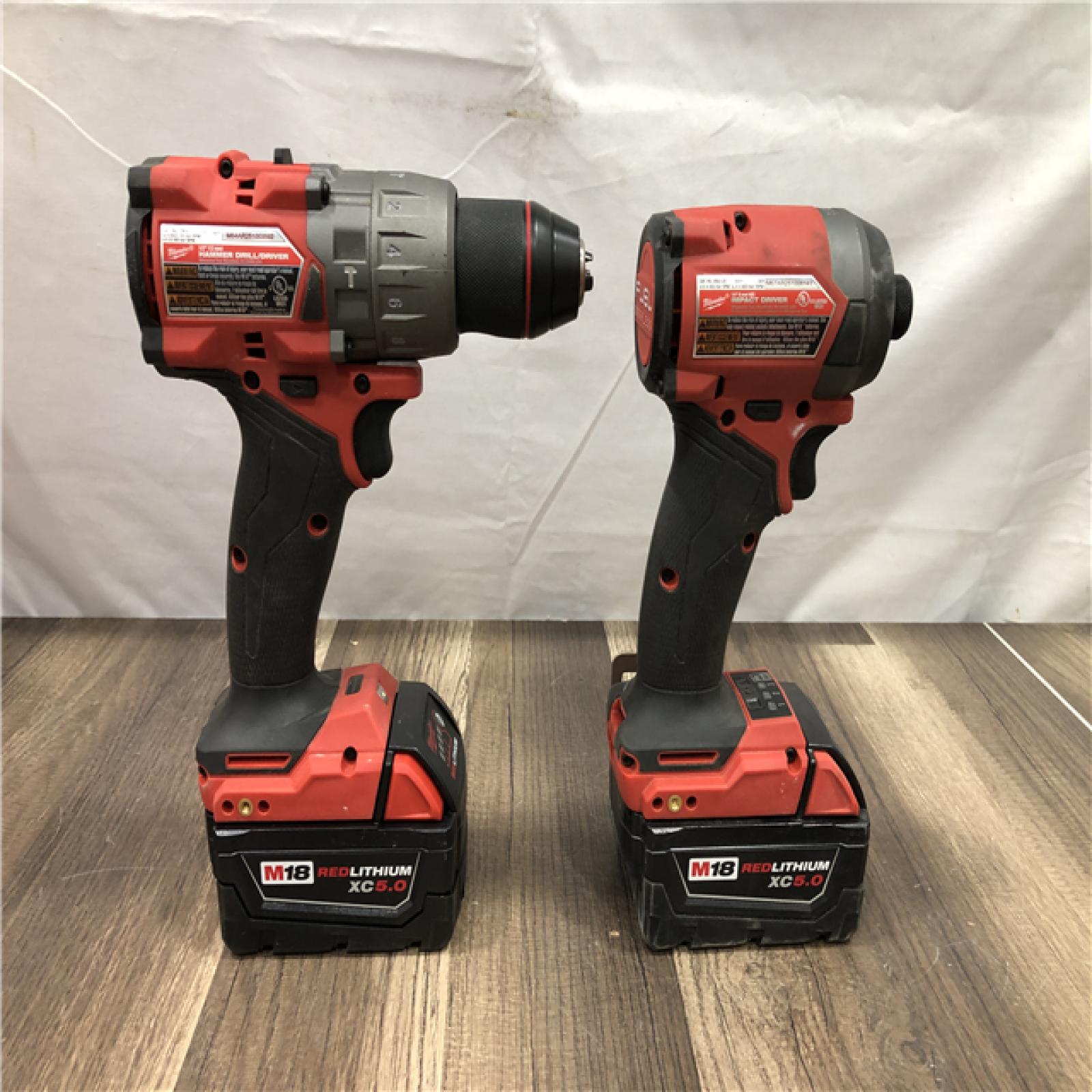 AS-IS Milwaukee FUEL 18V Lithium-Ion Brushless Cordless Hammer Drill and Impact Driver Combo Kit