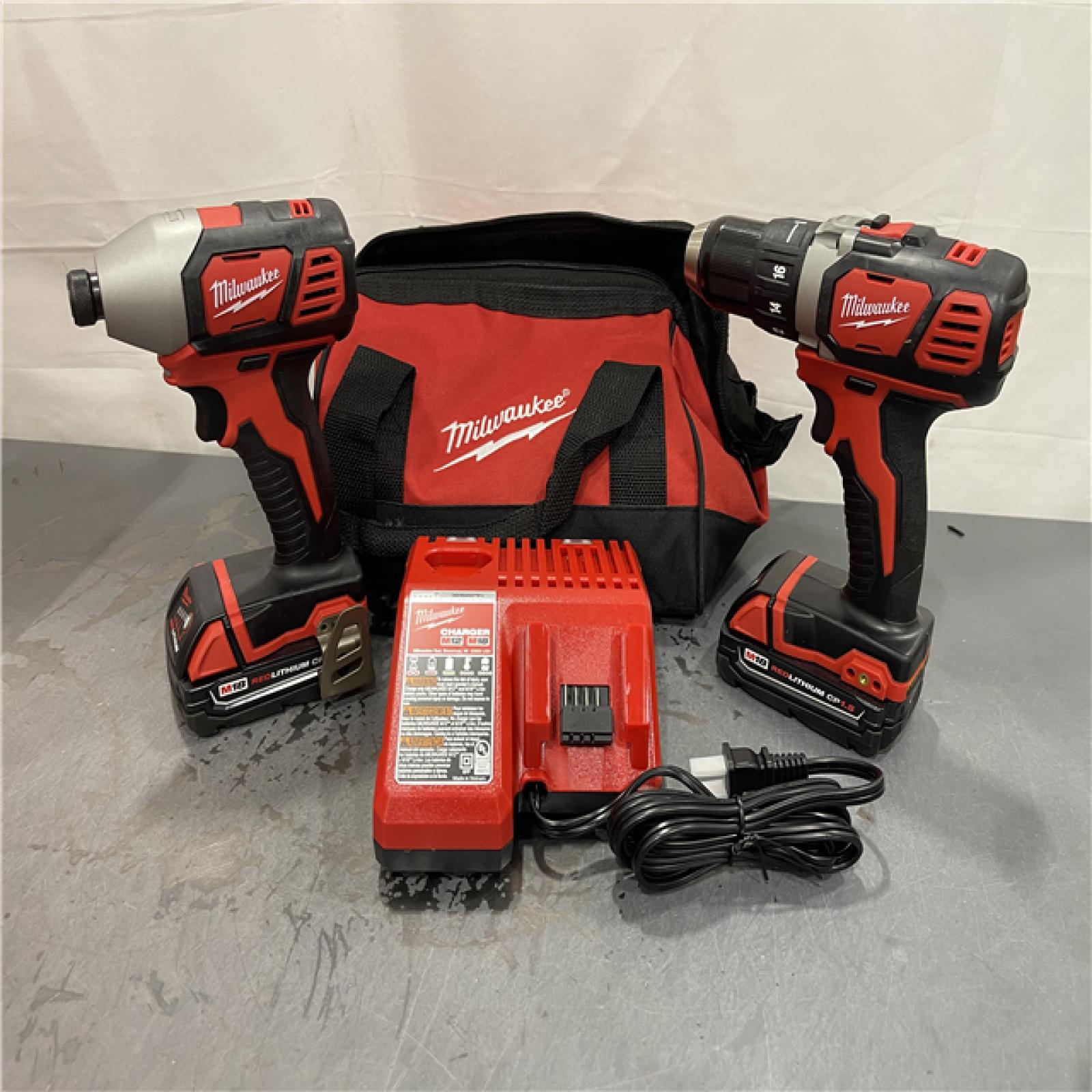 AS-IS - Milwaukee M18 18V Lithium-Ion Cordless Drill Driver/Impact Driver Combo Kit (2-Tool)