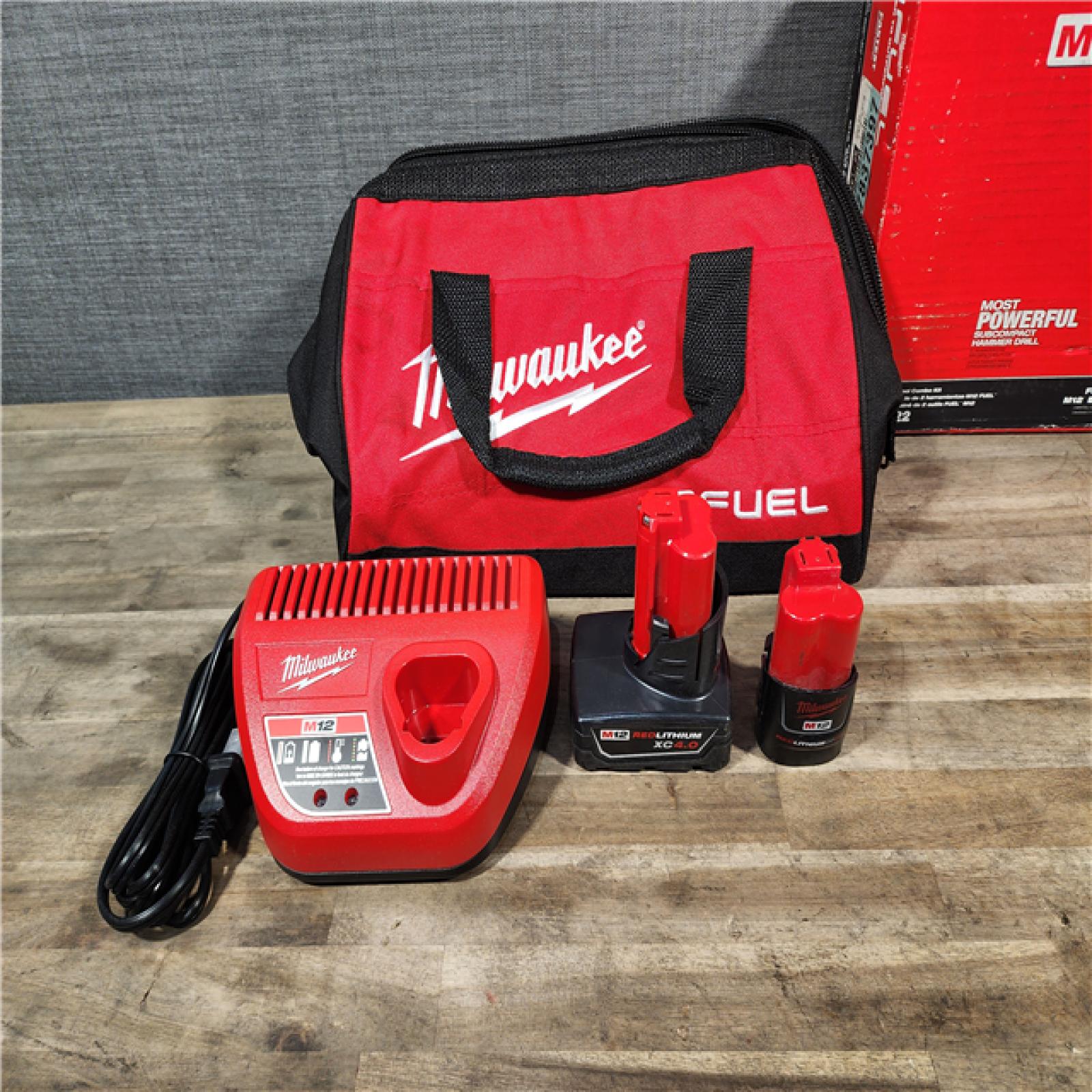 HOUSTON LOCATION - AS-IS Milwaukee 3497-22 12V Brushless Hammer Drill and Impact Driver Combo Kit