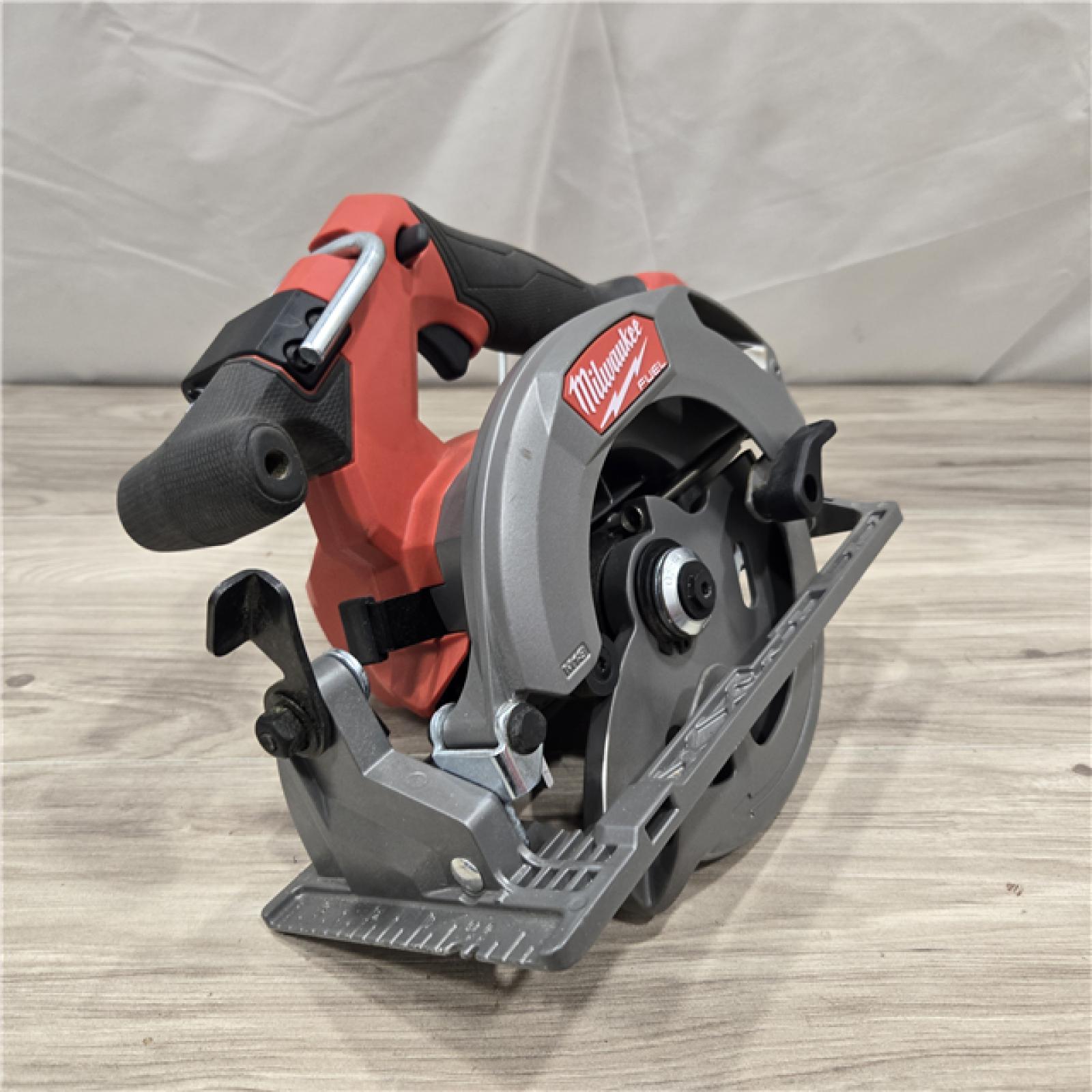 AS-IS Milwaukee M18 FUEL 18V  Cordless 6-1/2 in. Circular Saw (Tool-Only)