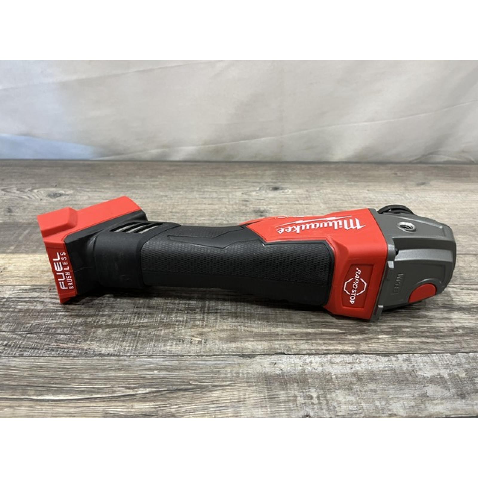 AS-IS Milwaukee FUEL 18V Lithium-Ion Brushless Cordless 4-1/2 in./5 in. Grinder w/Paddle Switch (Tool-Only)