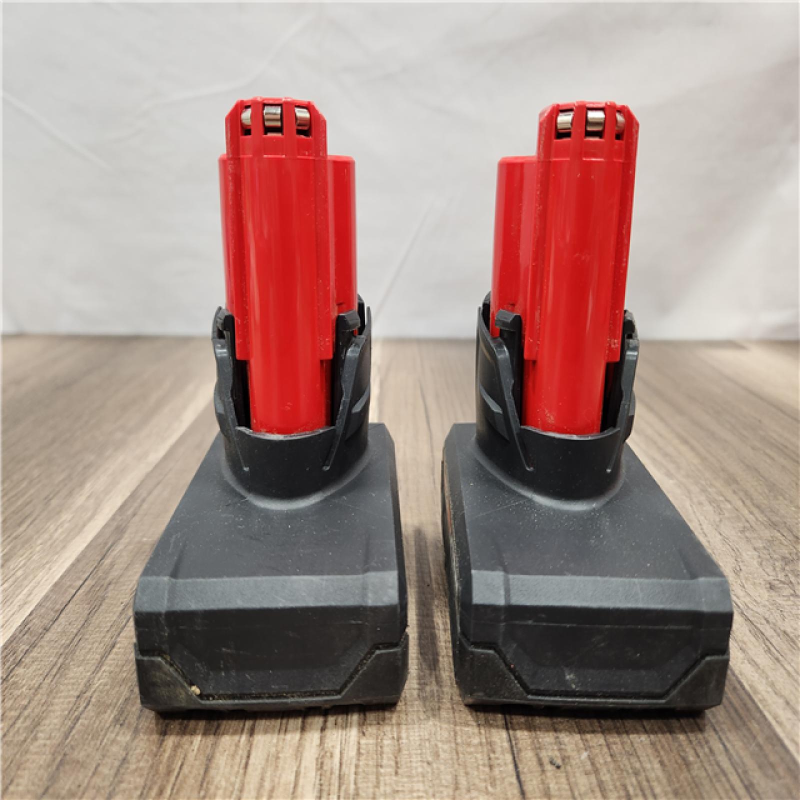 AS-IS- Milwaukee M12 12V Lithium-Ion XC High Output 5.0 Ah Battery Pack (2-Pack) Starter Kit with Charger