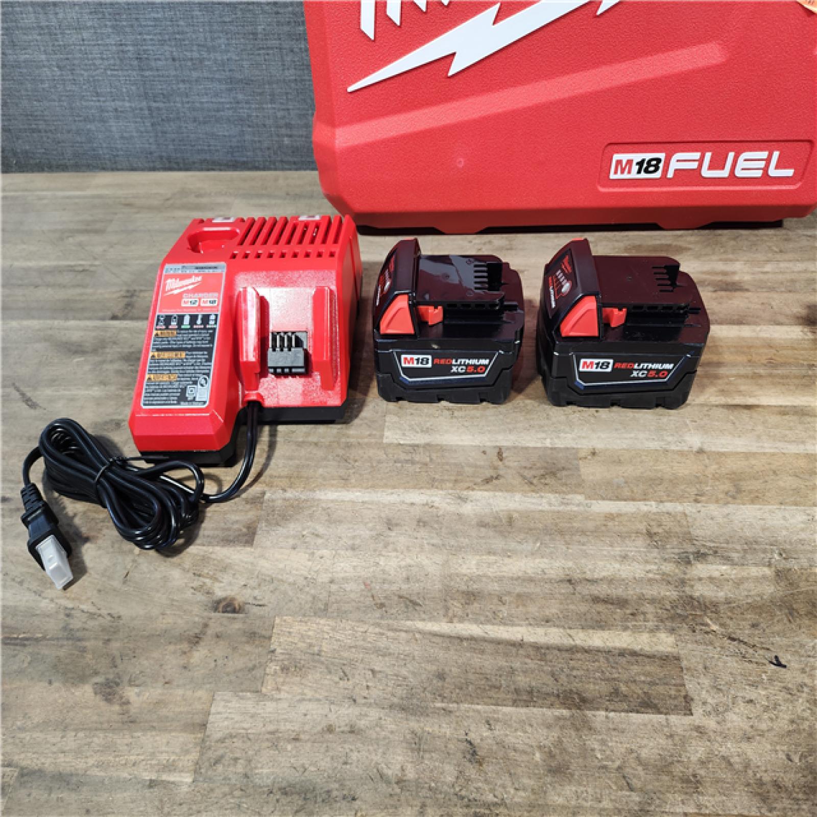 HOUSTON LOCATION - AS-IS (APPEARS LIKE NEW) MILWAUKEE FUEL 18V Lithium-Ion Brushless Cordless Hammer Drill and Impact Driver Combo Kit