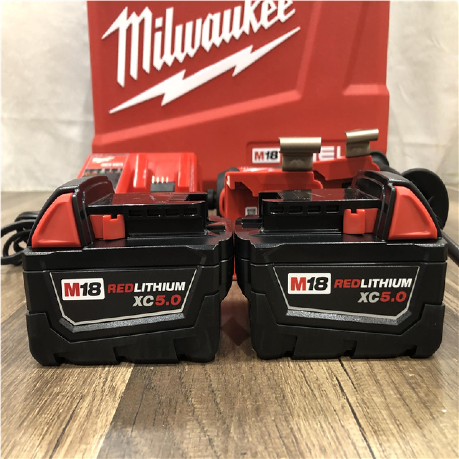 AS-IS Milwaukee FUEL 18V Lithium-Ion Brushless Cordless Hammer Drill and Impact Driver Combo Kit
