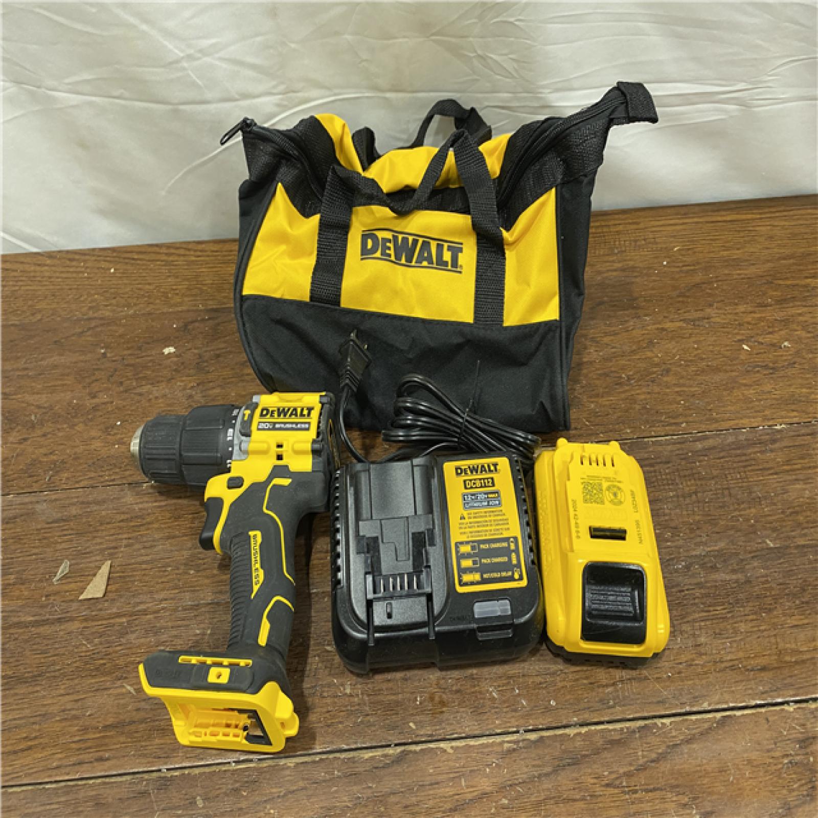 AS-IS DEWALT ATOMIC 20-Volt Lithium-Ion Cordless 1/2 in. Compact Hammer Drill with 3.0Ah Battery, Charger and Bag