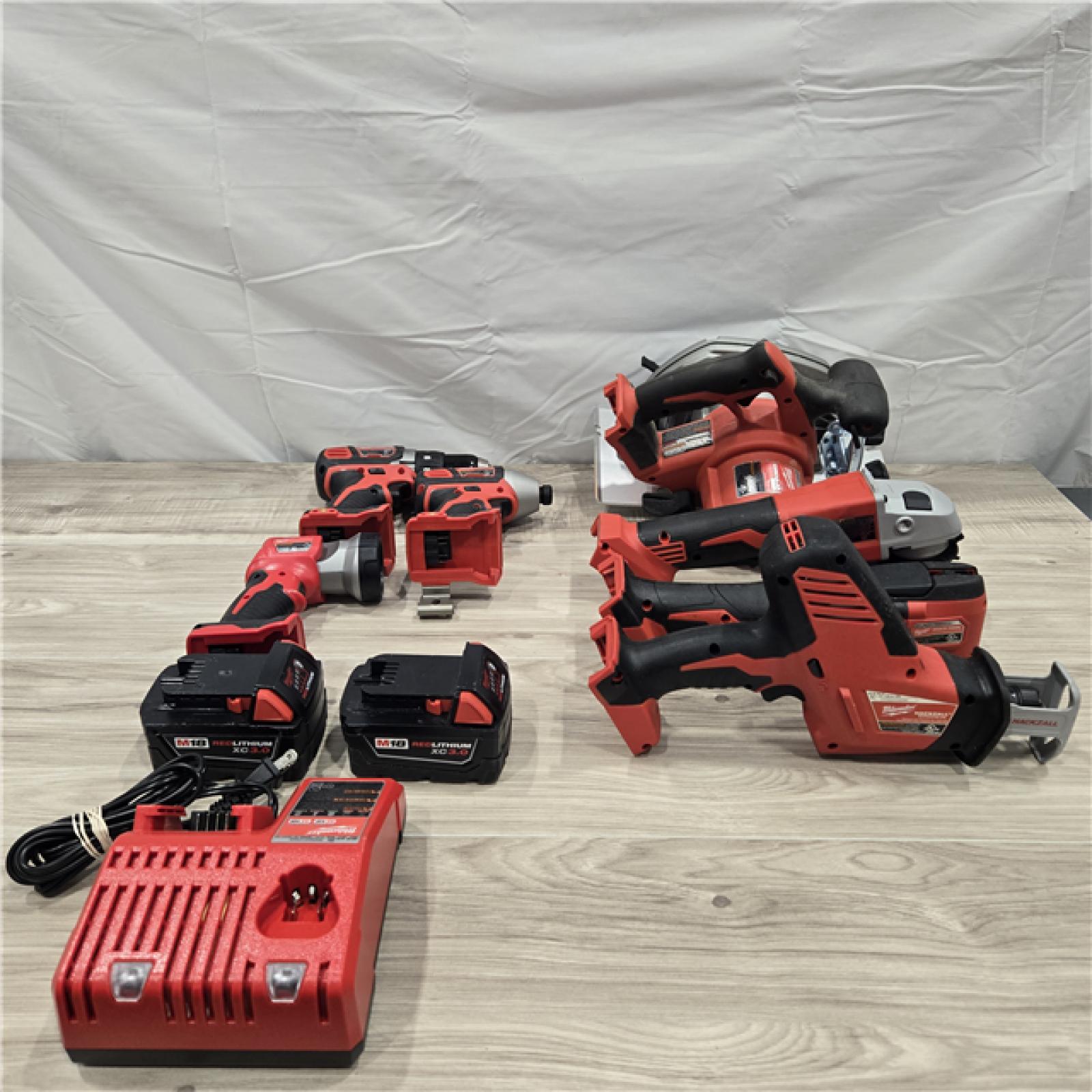 AS-IS  Milwaukee M18 18-Volt Lithium-Ion Cordless Combo Kit 7-Tool with 2-Batteries, Charger and Tool Bag