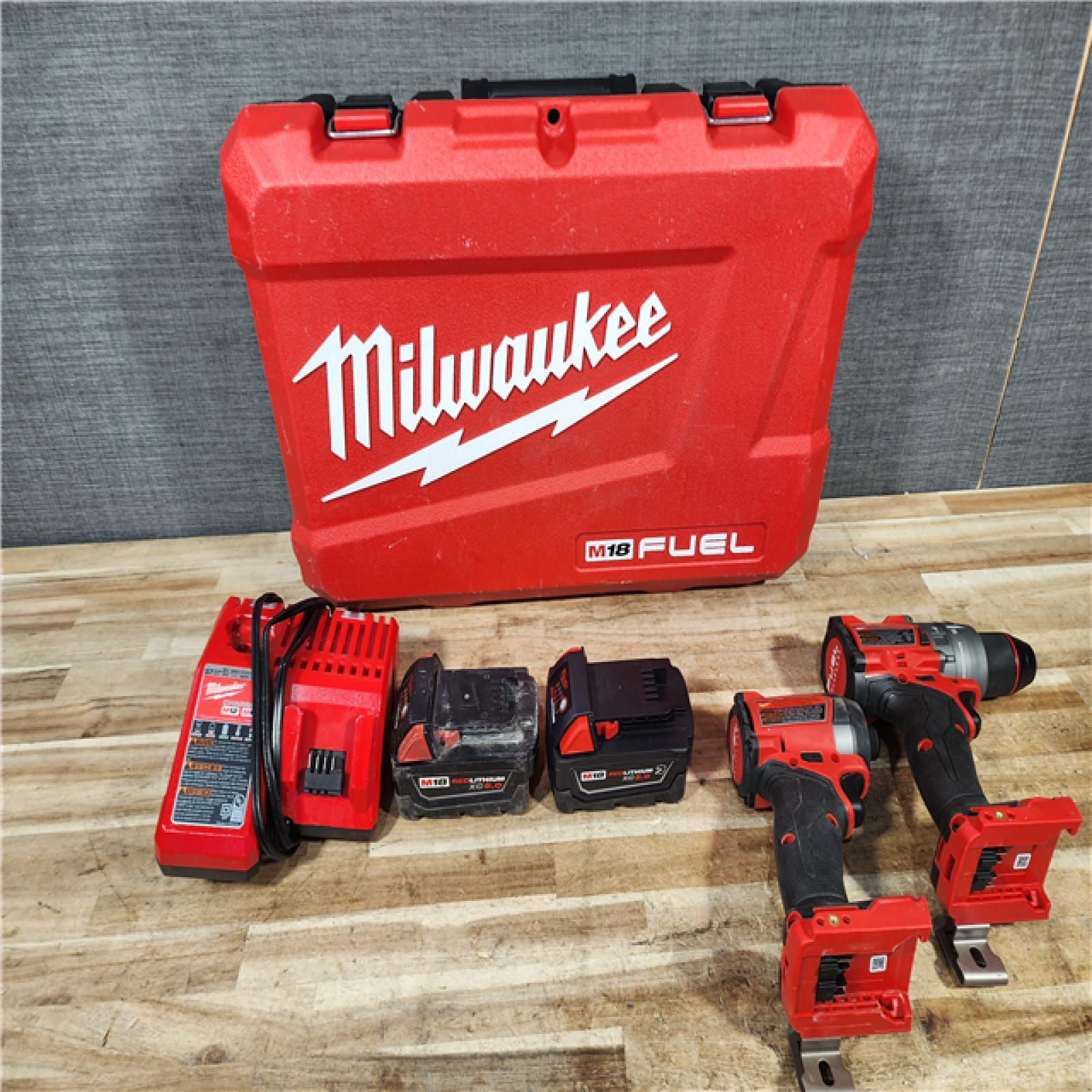HOUSTON LOCATION - AS - IS Milwaukee FUEL 18V Lithium-Ion Brushless Cordless Hammer Drill and Impact Driver Combo Kit