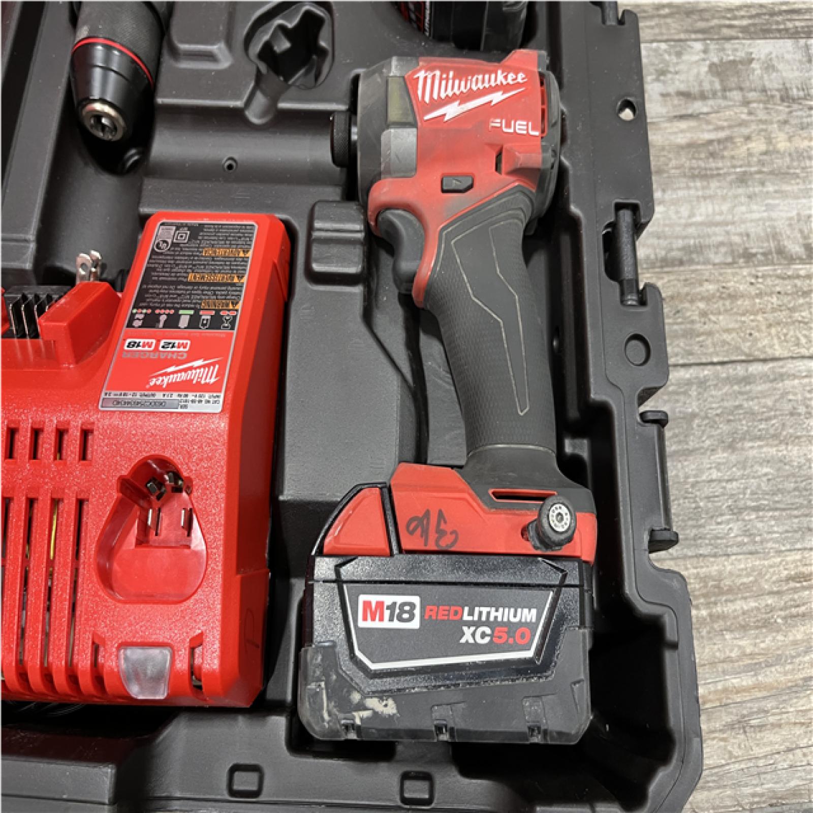 AS-IS Milwaukee FUEL 18V Lithium-Ion Brushless Cordless Hammer Drill and Impact Driver Combo Kit
