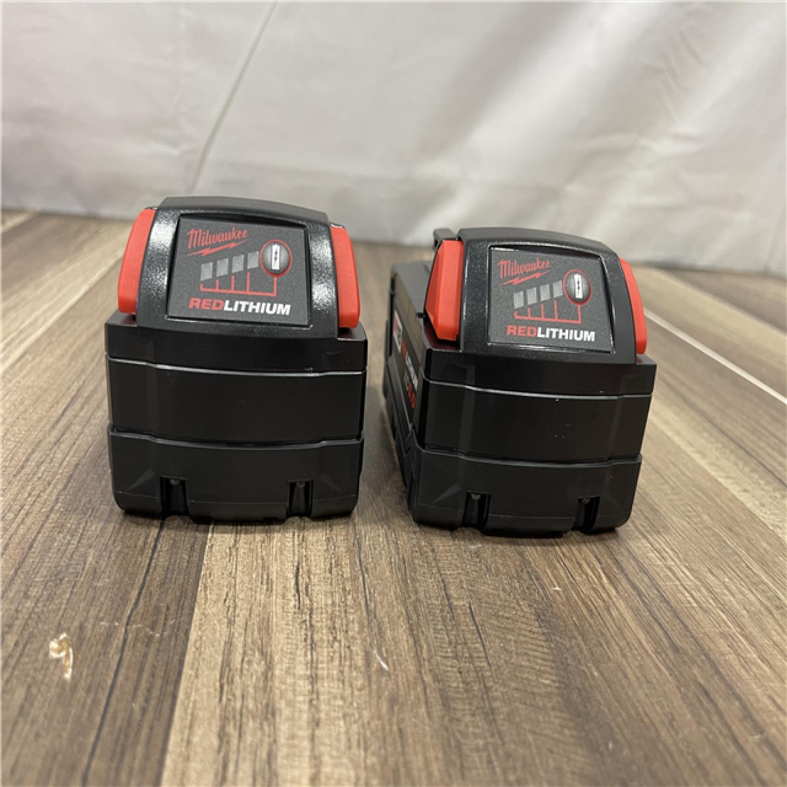 AS-IS Milwaukee M18 18-Volt Lithium-Ion XC Starter Kit with Two 5.0Ah Batteries and Charger