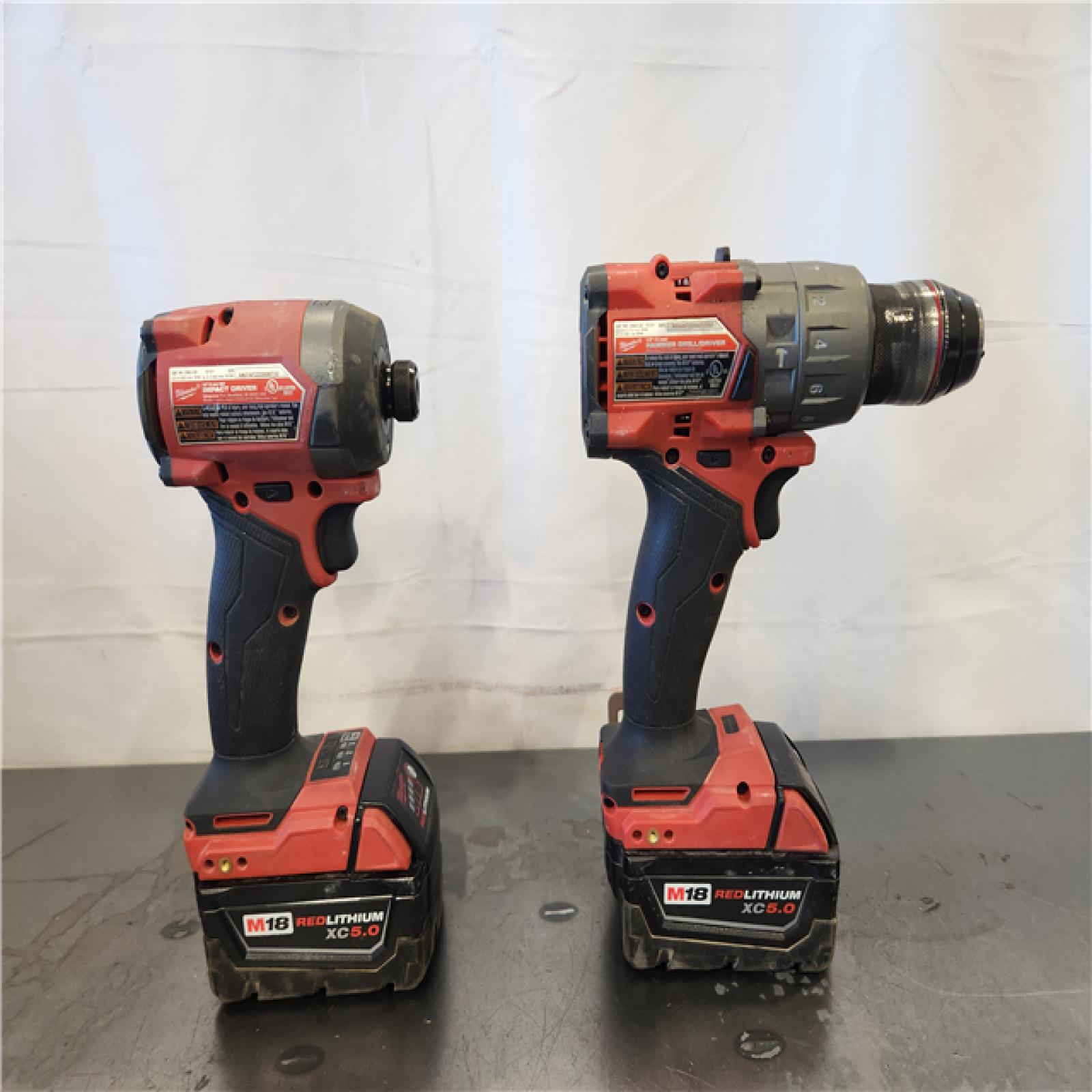 AS-IS- Milwaukee FUEL 18V Lithium-Ion Brushless Cordless Hammer Drill and Impact Driver Combo Kit