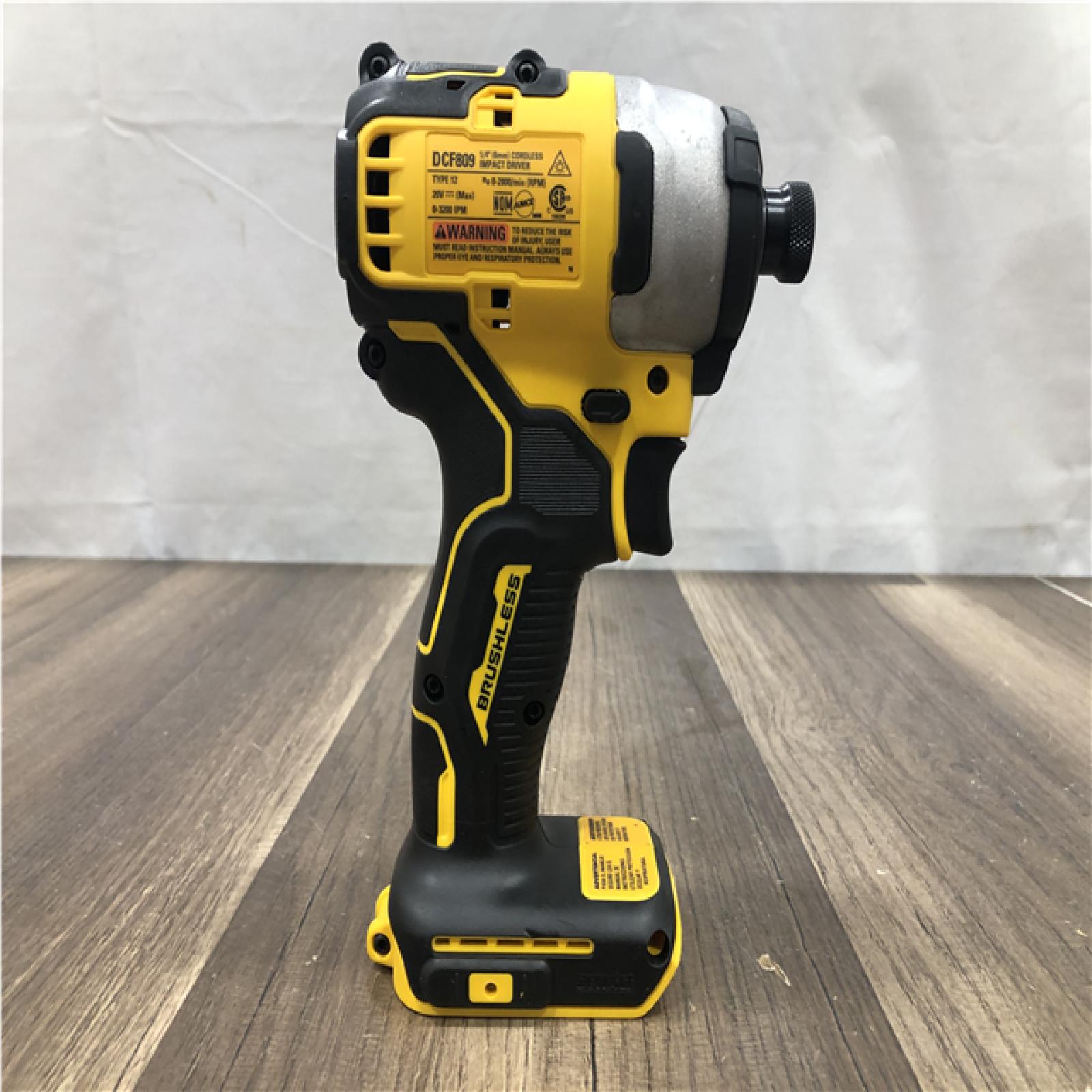 AS-IS DEWALT ATOMIC 20V MAX Cordless Brushless Compact 1/4 in. Impact Driver (Tool Only)