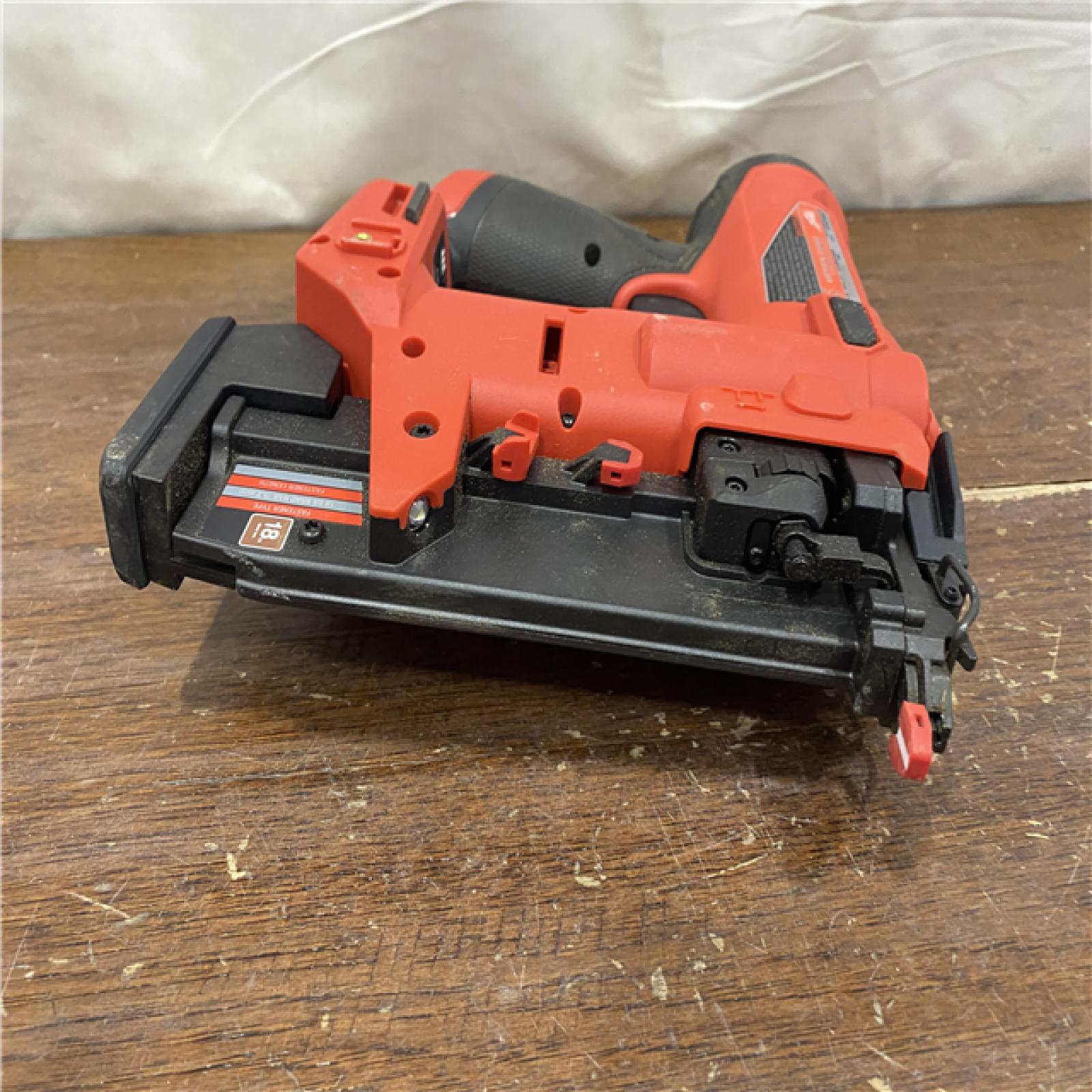AS-IS M12 FUEL 12-Volt Lithium-Ion Brushless Cordless 18-Guage Compact Brad Nailer (Tool Only)