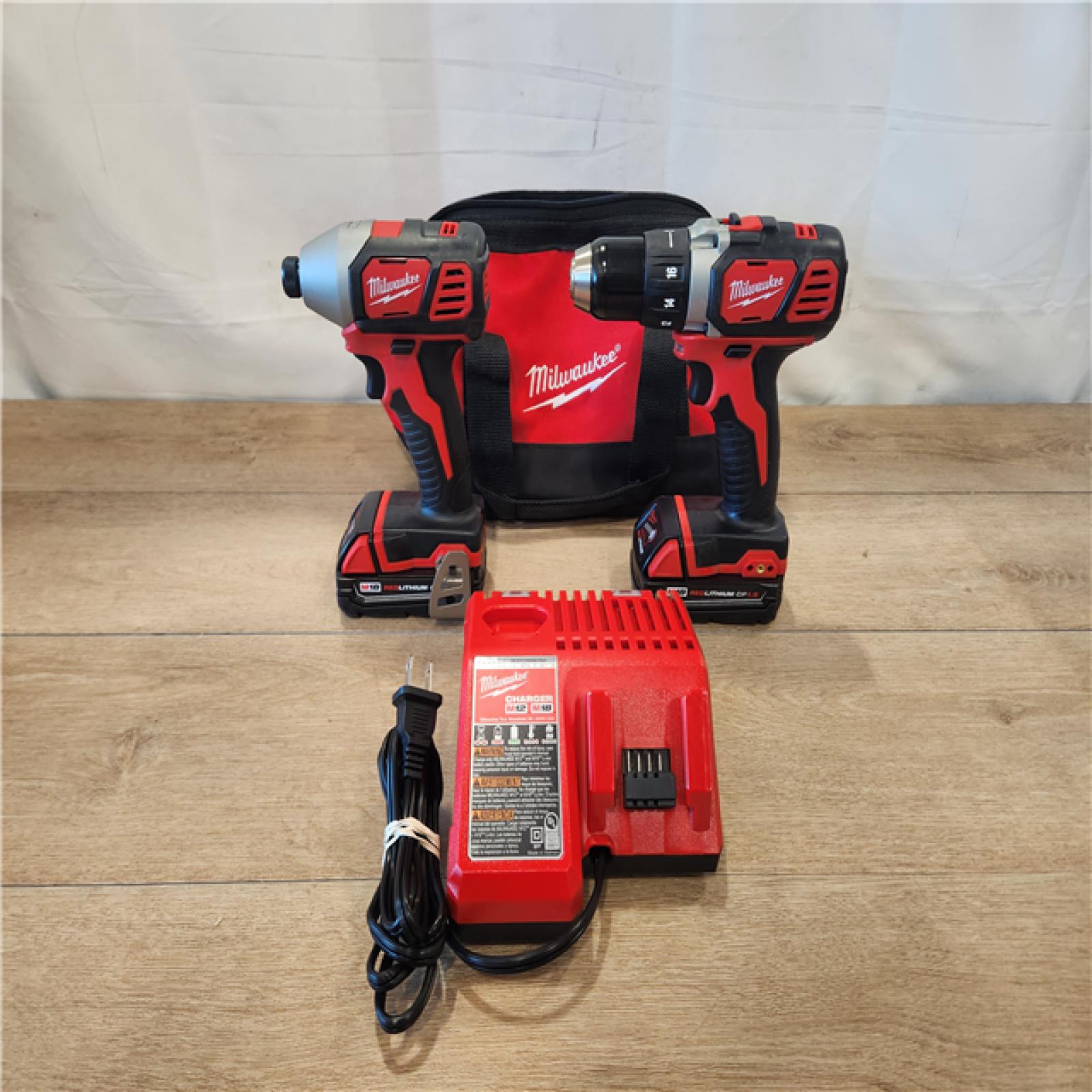 AS-IS- Milwaukee 18V Lithium-Ion Cordless Drill Driver/Impact Driver Combo Kit