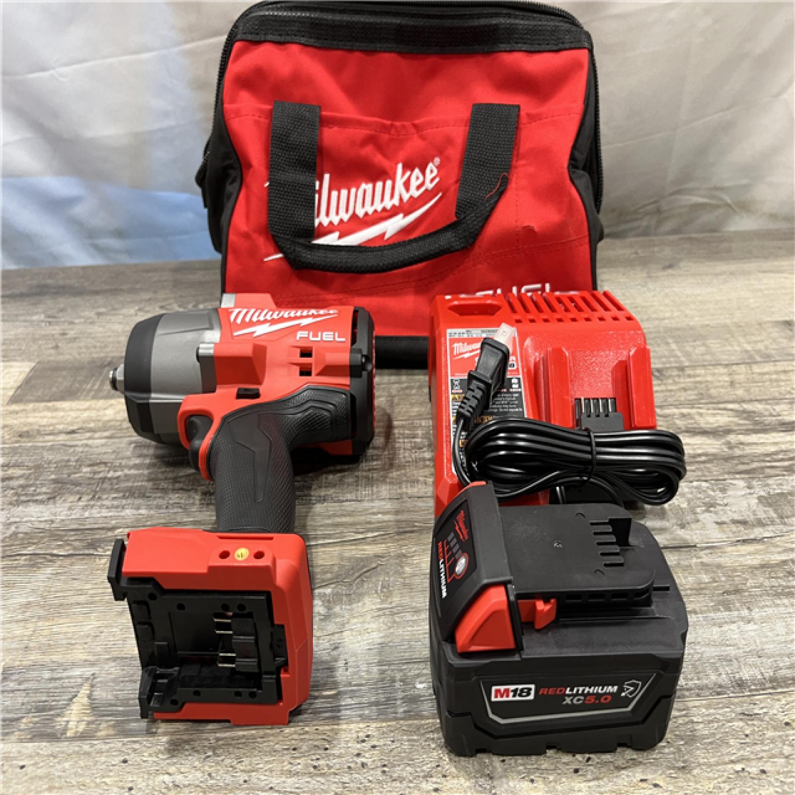 AS-IS Milwaukee FUEL 18V Lithium-Ion Brushless Cordless 1/2 in. Impact Wrench w/Friction Ring Kit