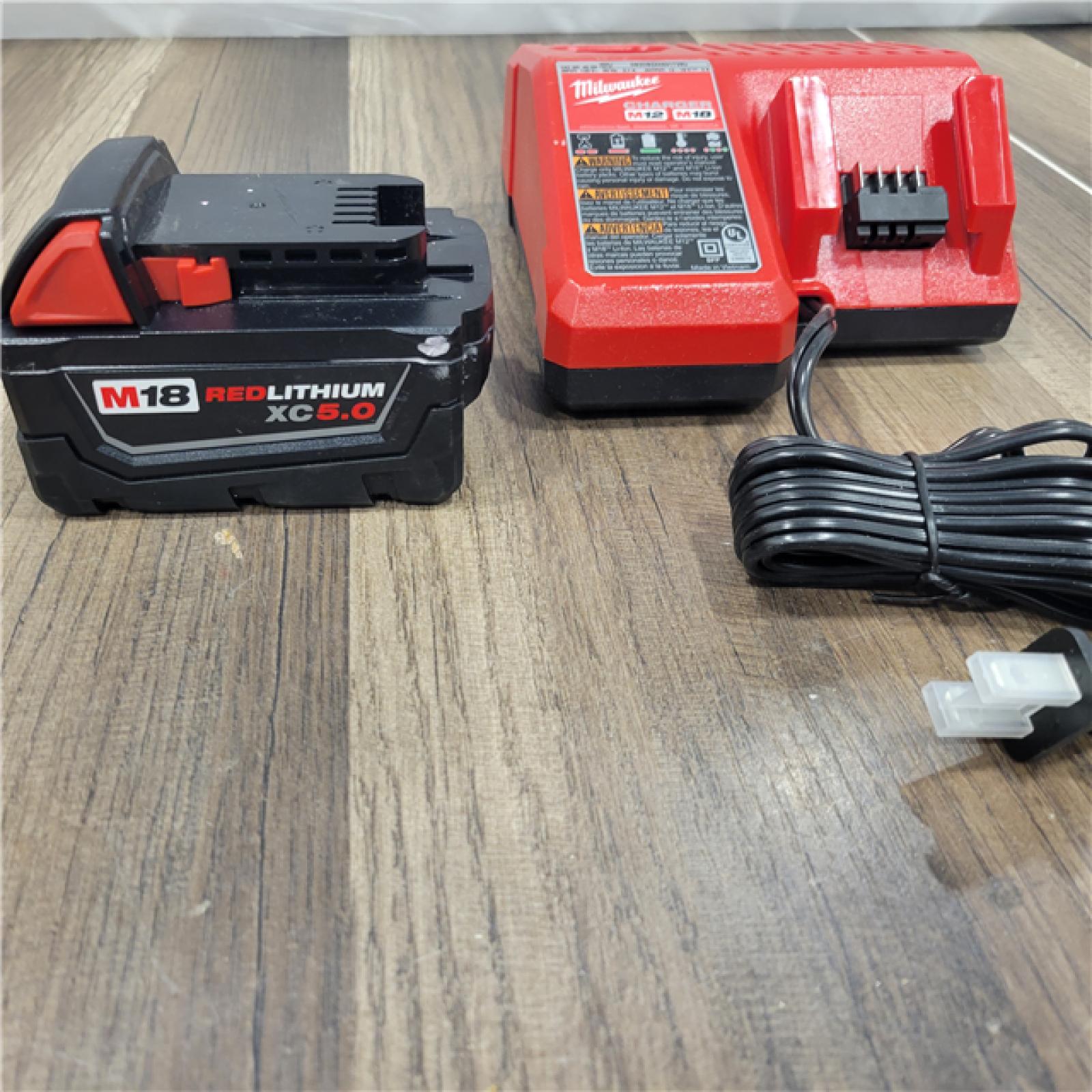 AS-IS Milwaukee M18 18-Volt Lithium-Ion XC Starter Kit with (1) 5.0Ah Battery and Charger