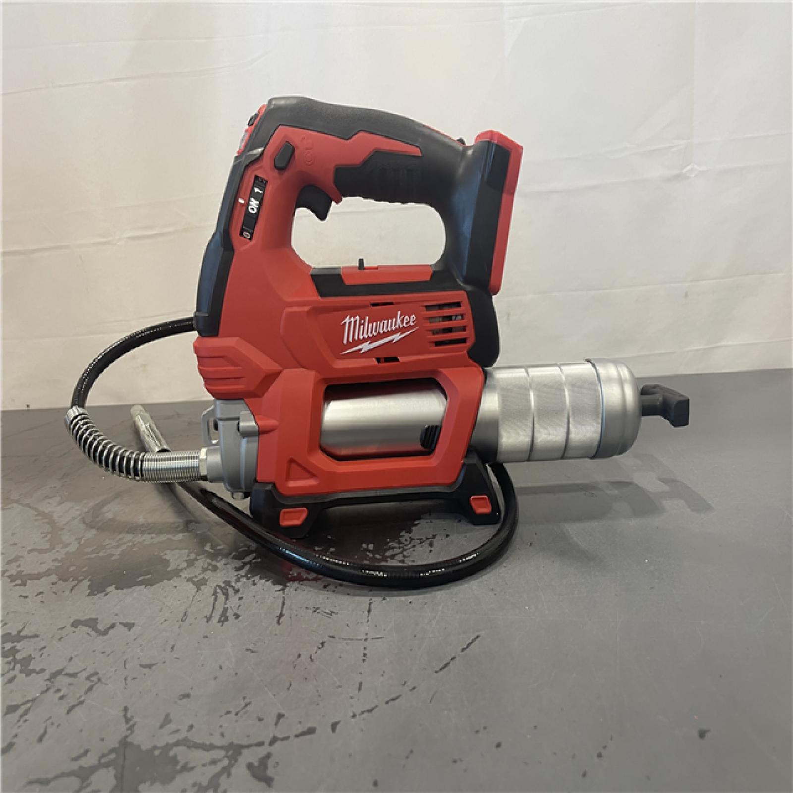 AS-IS- Milwaukee Tool 10,000 PSI 14 Oz Battery-Operated Grease Gun - 48 Flexible Hose, 31 Strokes/oz