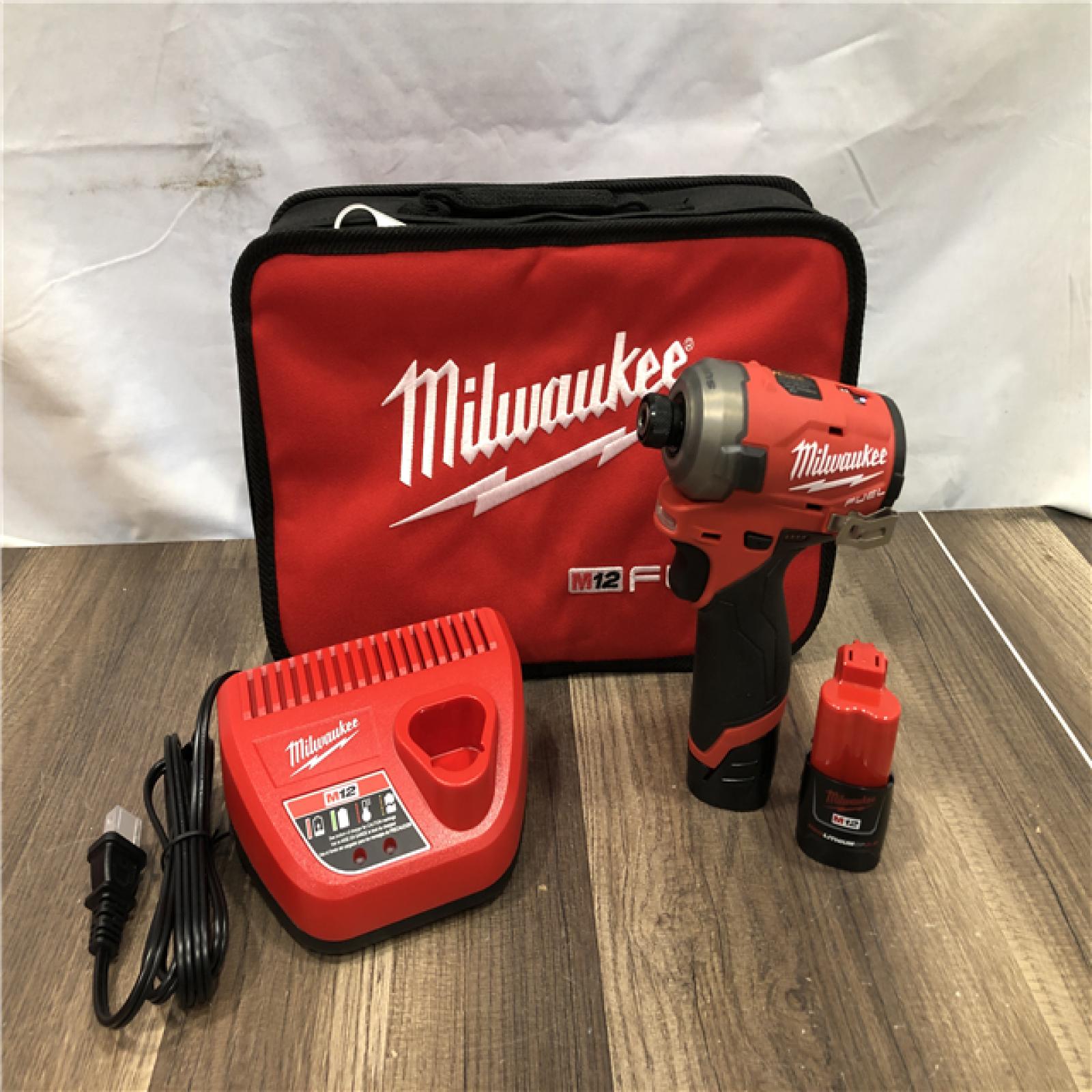 AS-IS Milwaukee FUEL SURGE 12V Lithium-Ion Brushless Cordless 1/4 in. Hex Impact Driver Compact Kit